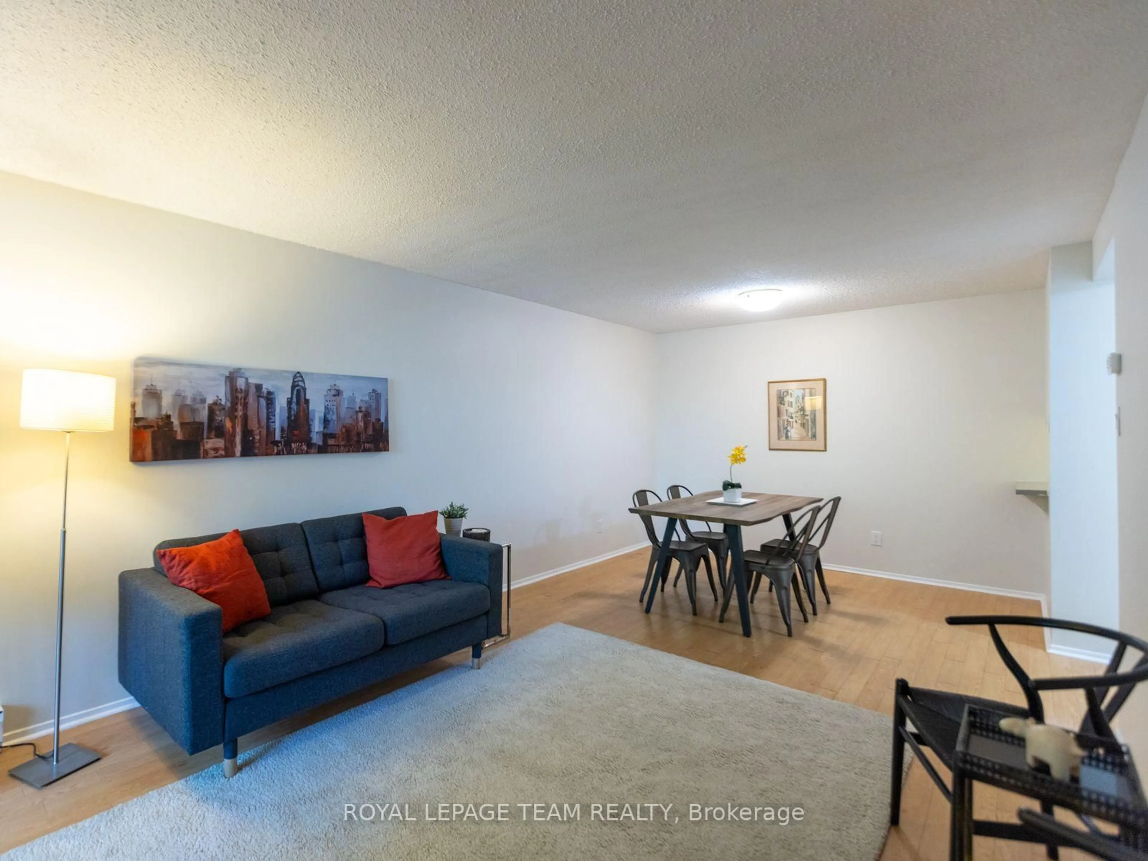 Living room with furniture, unknown for 200 Bay St #404, Ottawa Ontario K1R 7W8