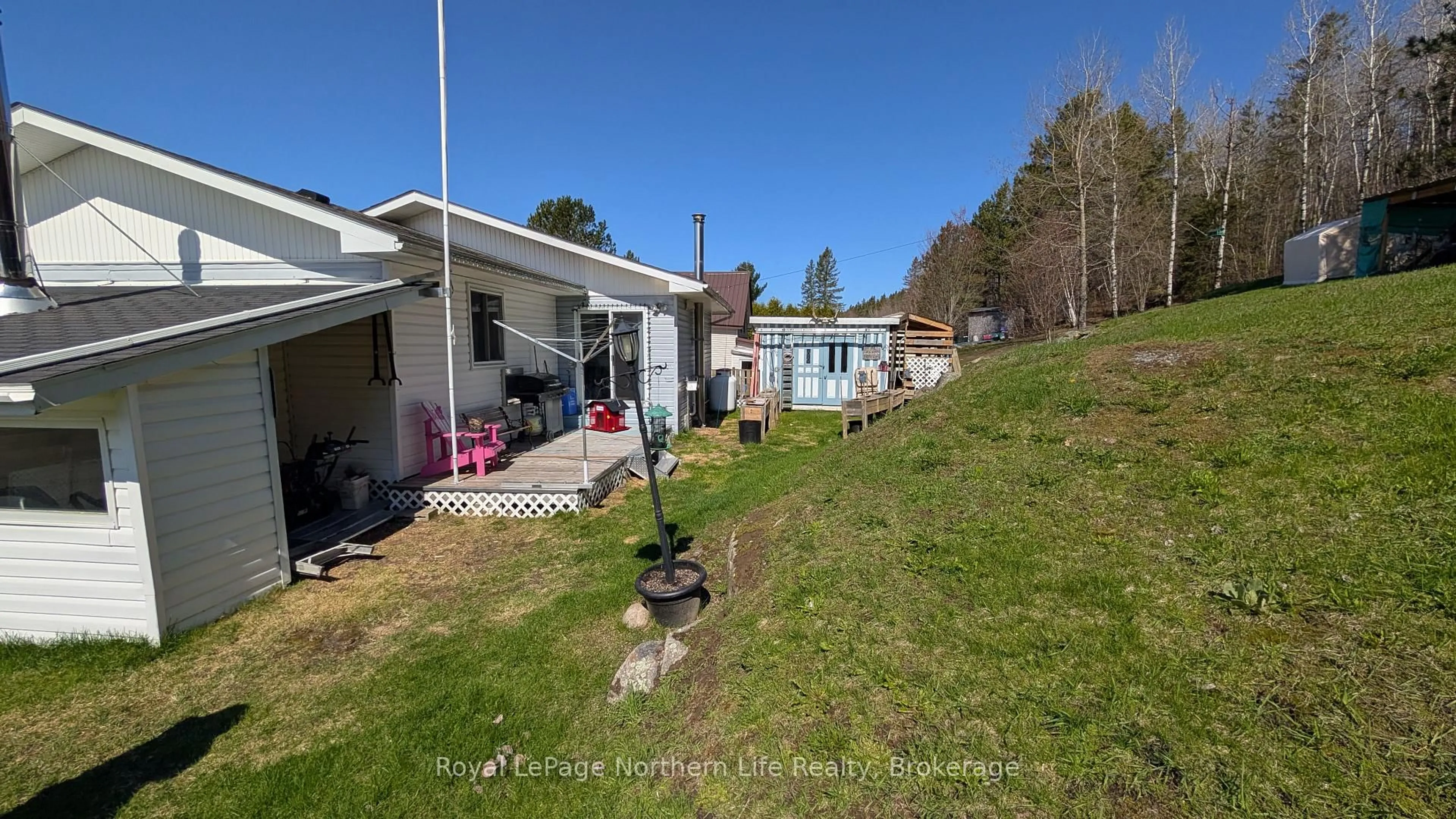 A pic from outside/outdoor area/front of a property/back of a property/a pic from drone, unknown for 141 Larocque St, West Nipissing Ontario P0H 1M0