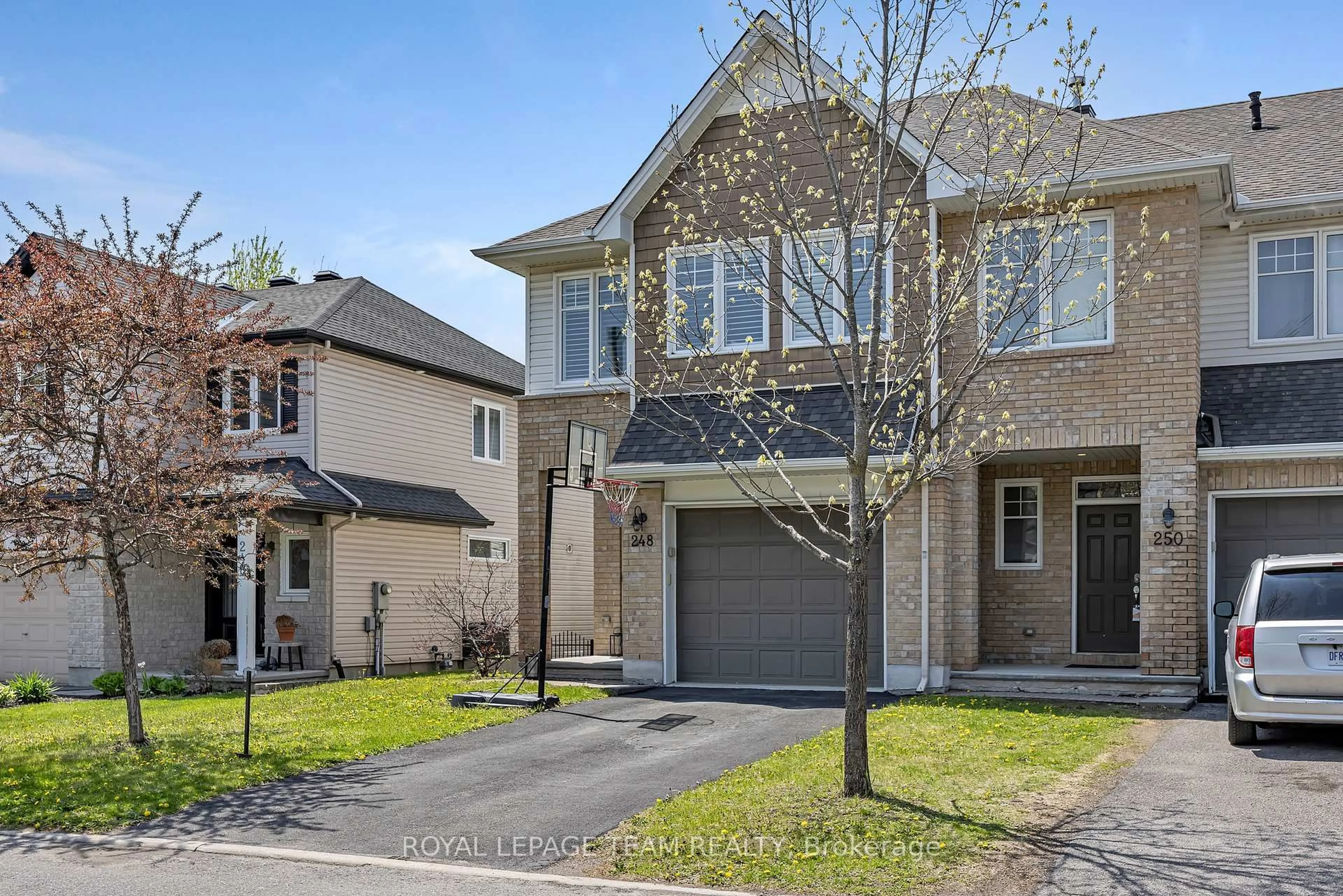 Home with brick exterior material, street for 248 Meadowlilly Rd, Ottawa Ontario K1T 0H4