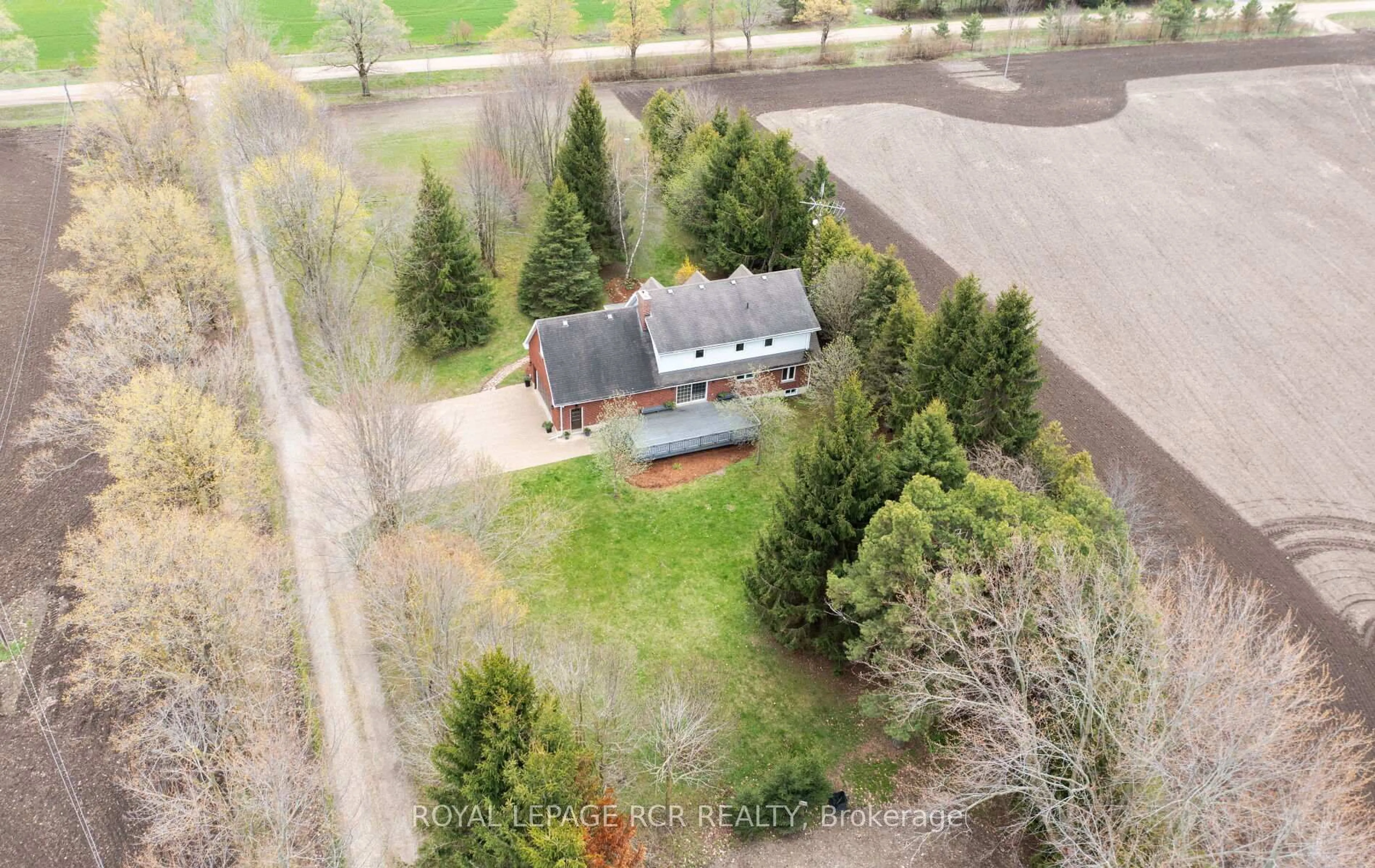 A pic from outside/outdoor area/front of a property/back of a property/a pic from drone, forest/trees view for 361225 Con 8-9, East Luther Grand Valley Ontario L9W 0X8