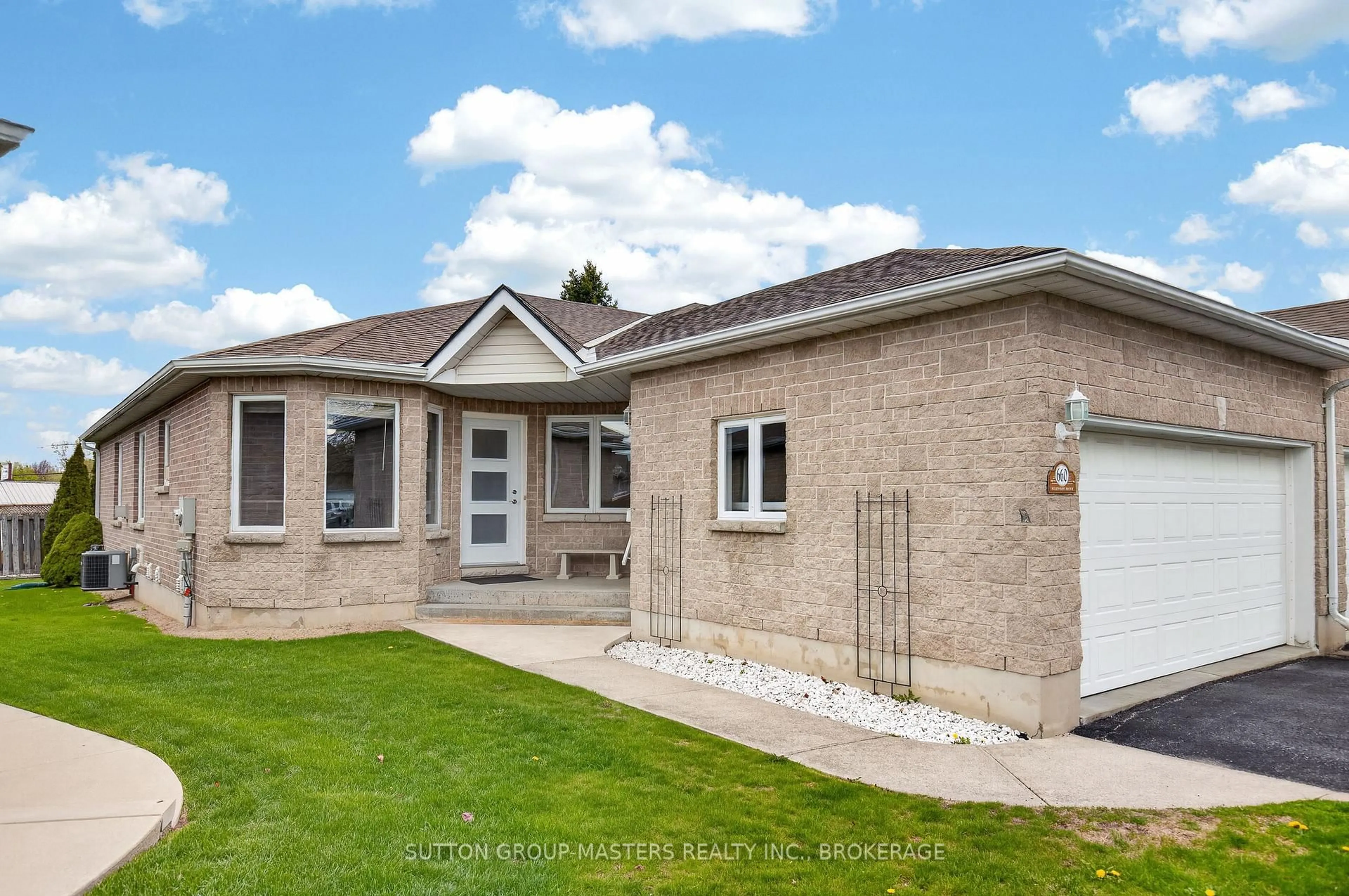Home with brick exterior material, street for 660 Millwood Dr, Kingston Ontario K7M 8Z1