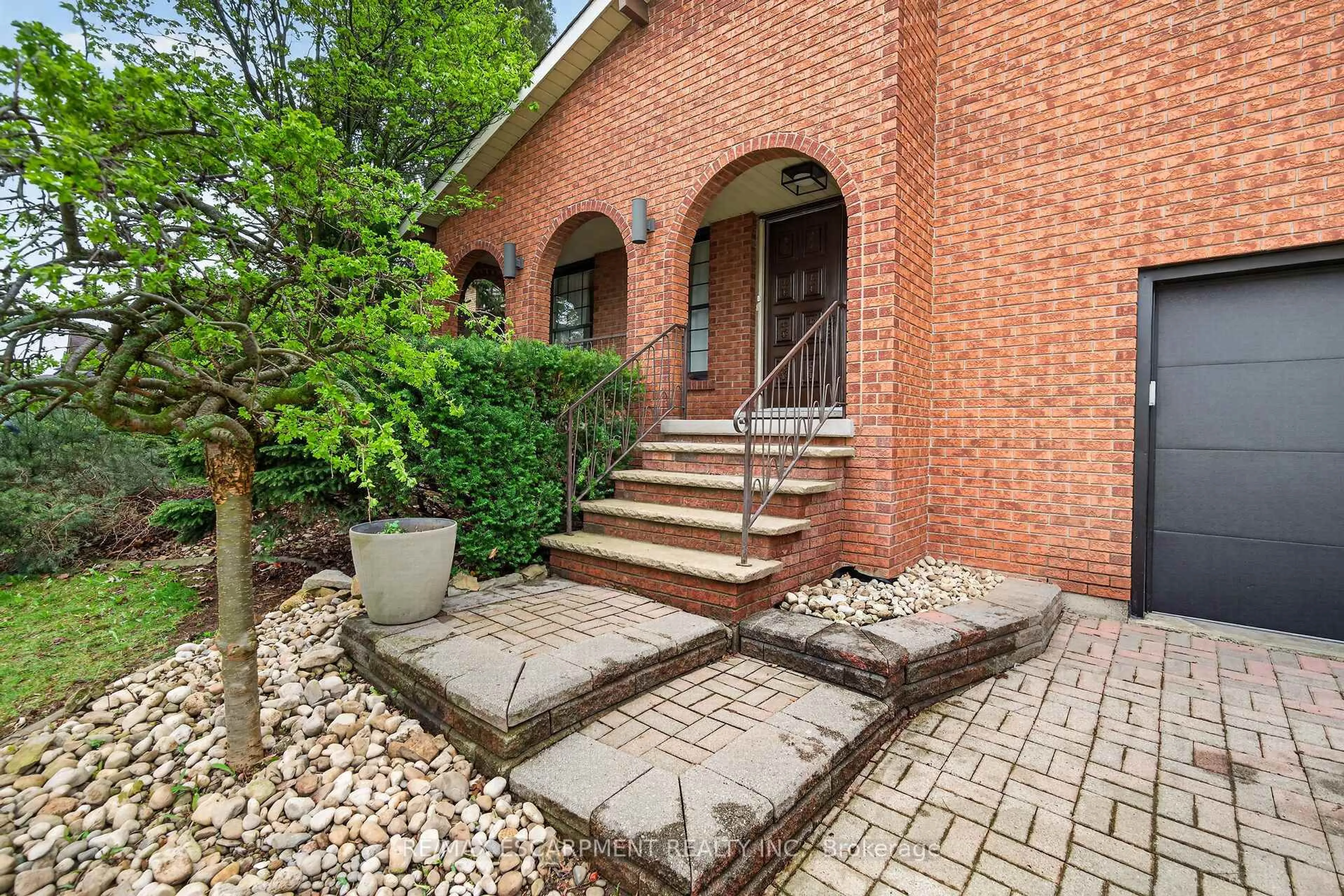 Home with brick exterior material, street for 51 President Dr, Hamilton Ontario L8G 4H2