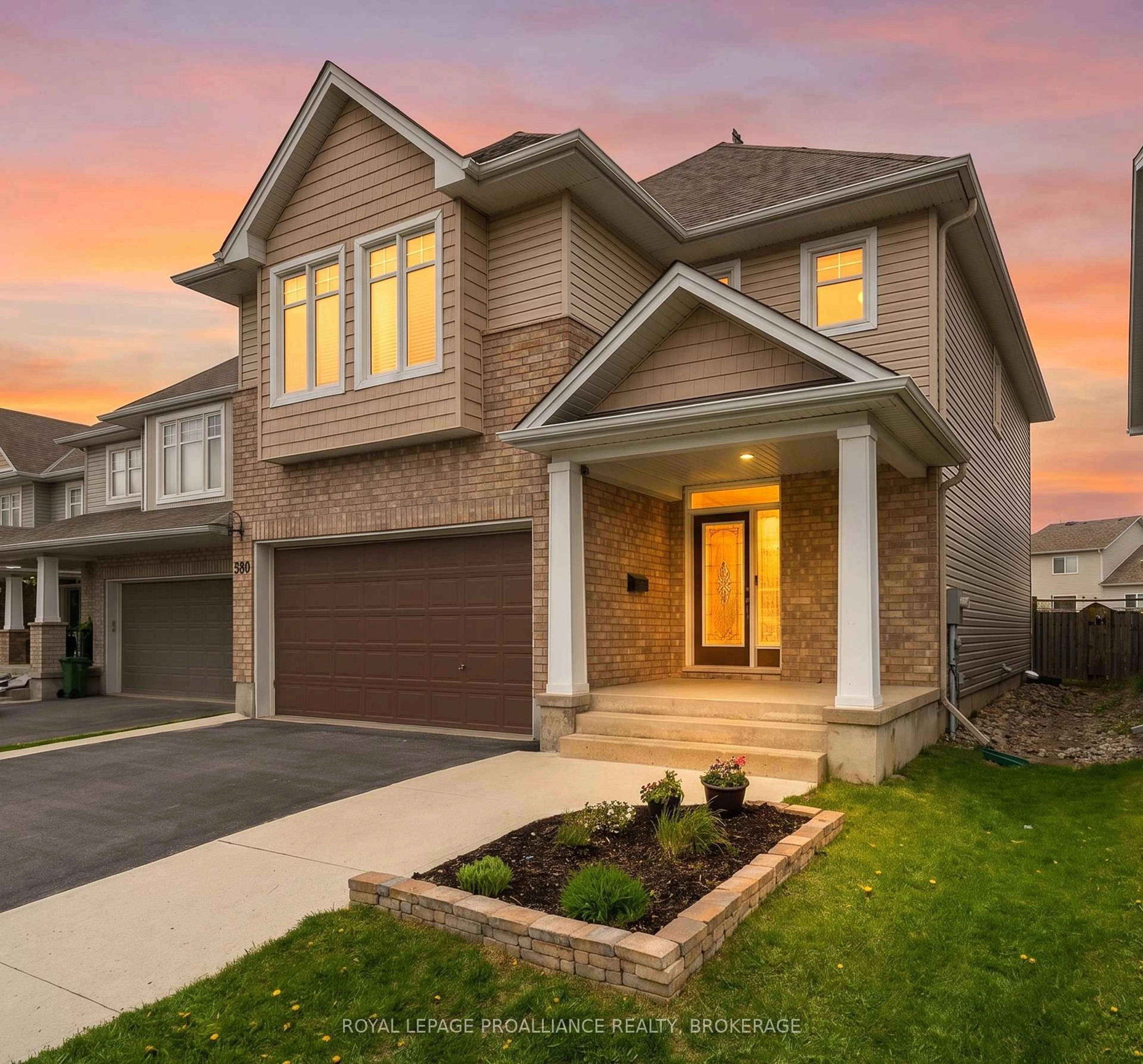 Home with brick exterior material, street for 680 Fieldstone Dr, Kingston Ontario K7K 0C6