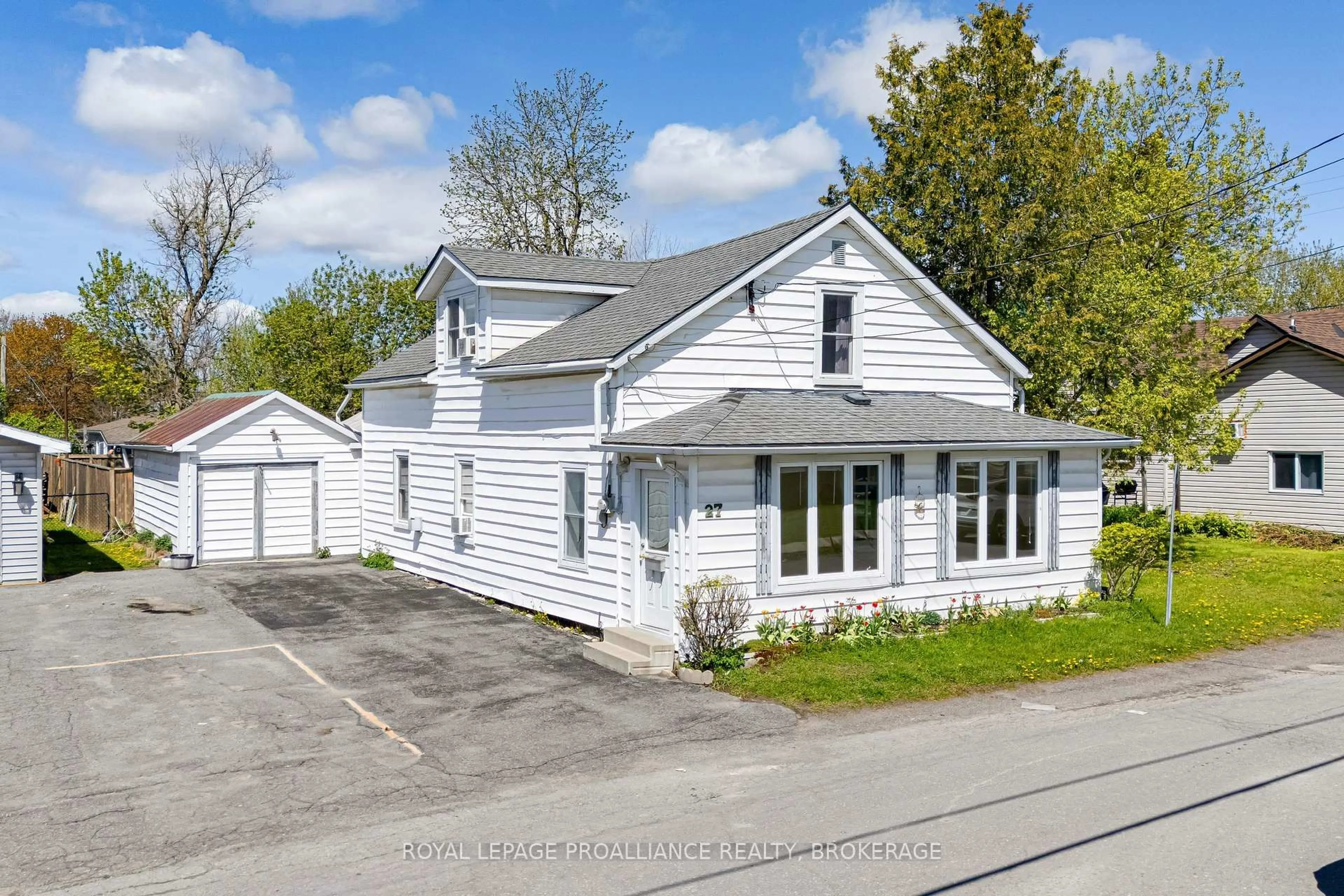 A pic from outside/outdoor area/front of a property/back of a property/a pic from drone, street for 27 Centre St, Bissett Creek Ontario K0H 2H0