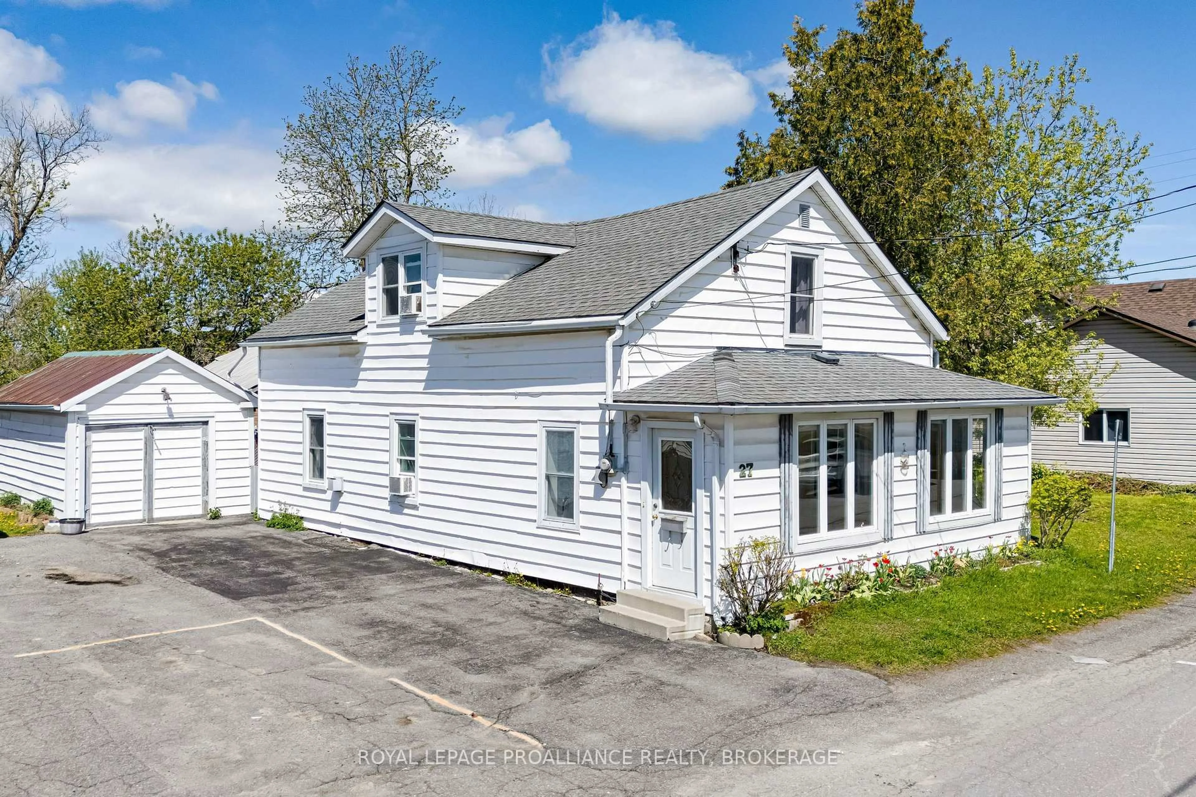 A pic from outside/outdoor area/front of a property/back of a property/a pic from drone, street for 27 Centre St, Bissett Creek Ontario K0H 2H0