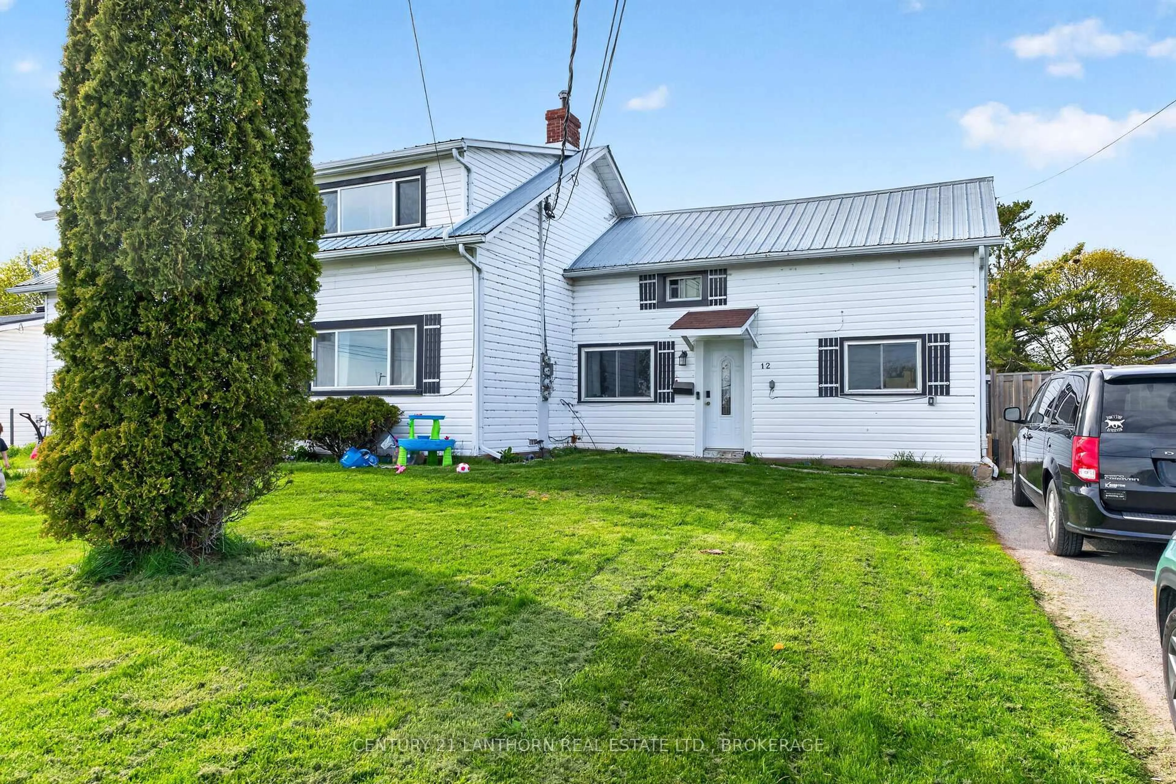 A pic from outside/outdoor area/front of a property/back of a property/a pic from drone, unknown for 10/12 Manitou Cres, Loyalist Ontario K7N 1B6