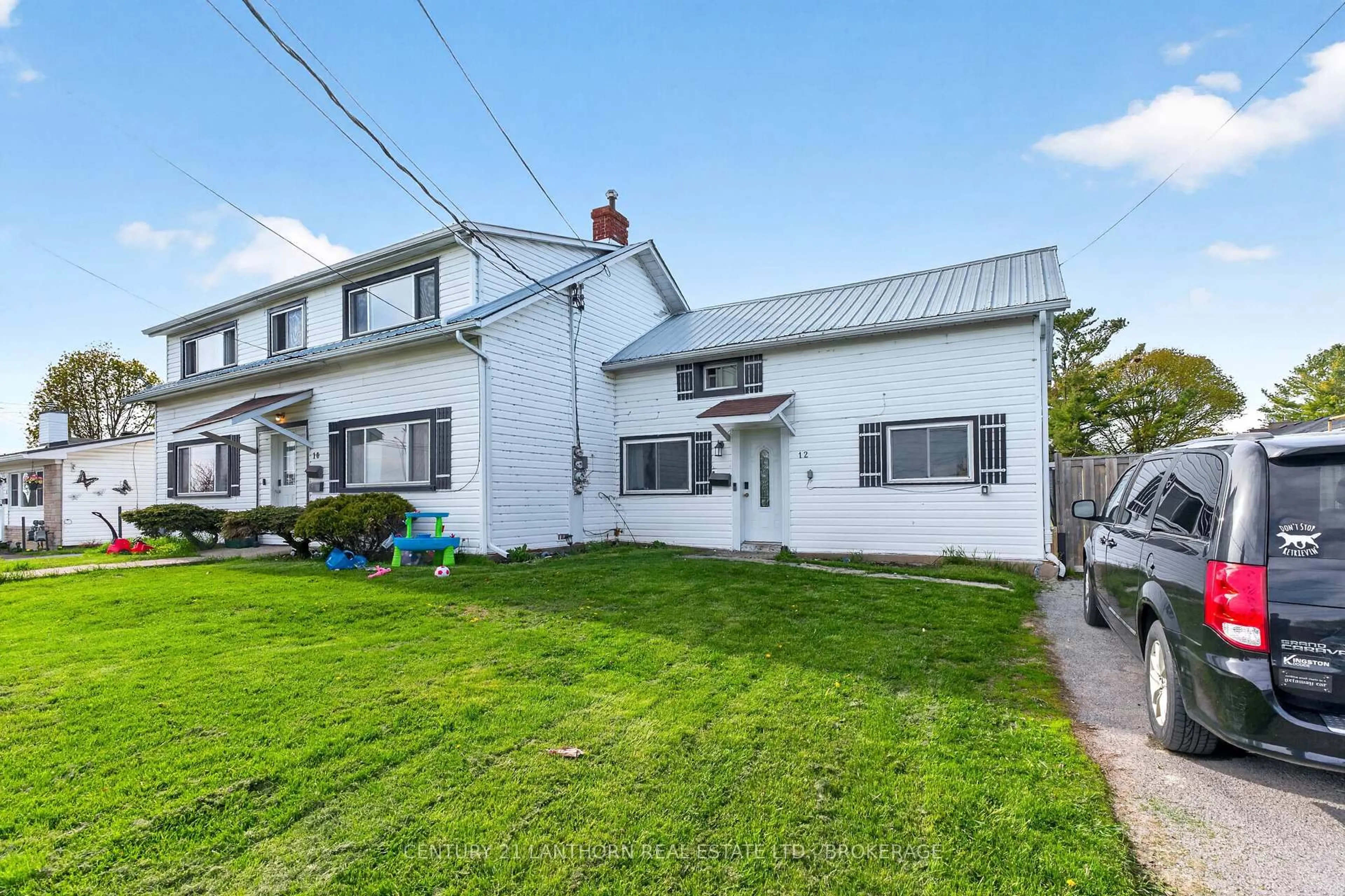 A pic from outside/outdoor area/front of a property/back of a property/a pic from drone, street for 10/12 Manitou Cres, Loyalist Ontario K7N 1B6