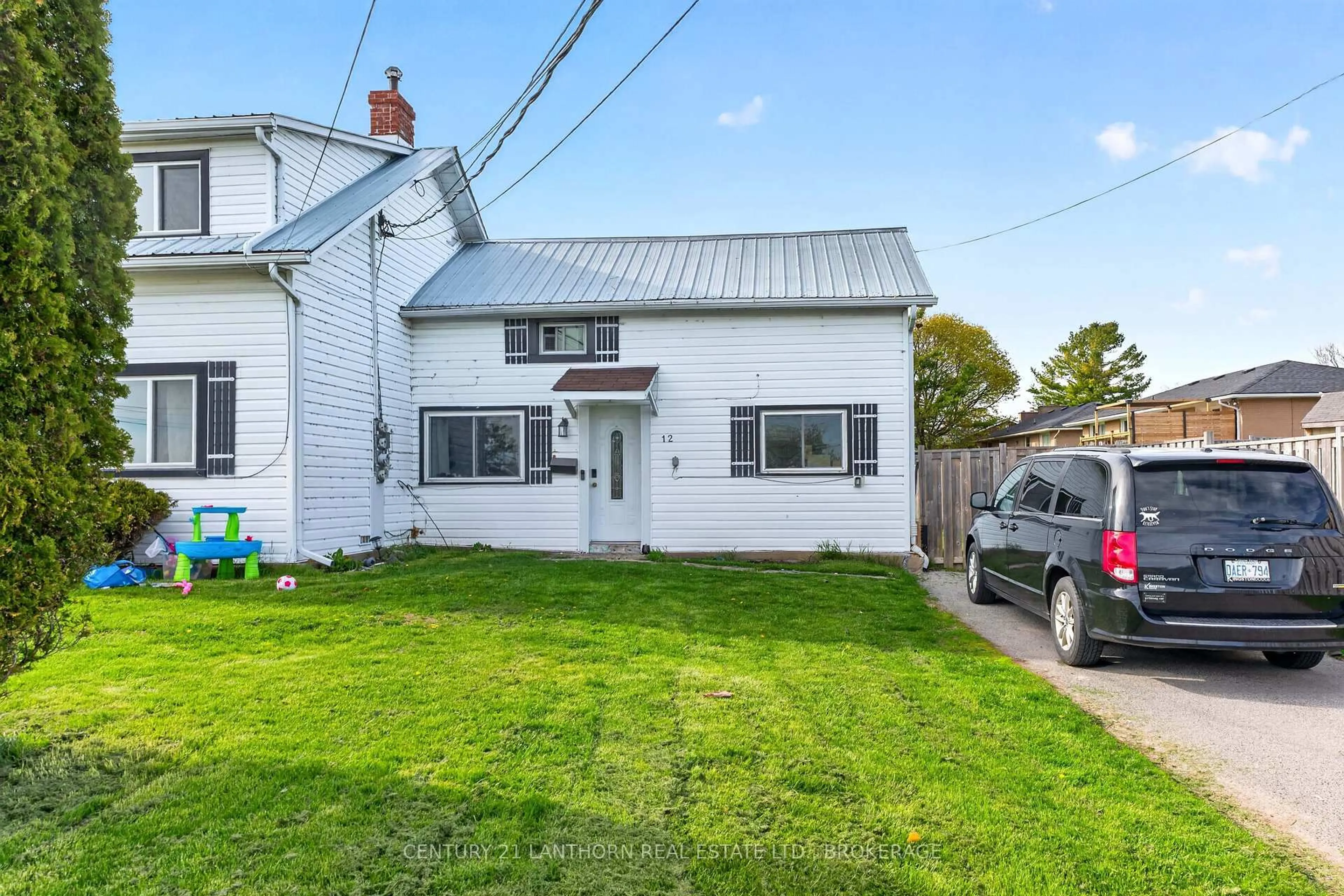 A pic from outside/outdoor area/front of a property/back of a property/a pic from drone, street for 10/12 Manitou Cres, Loyalist Ontario K7N 1B6