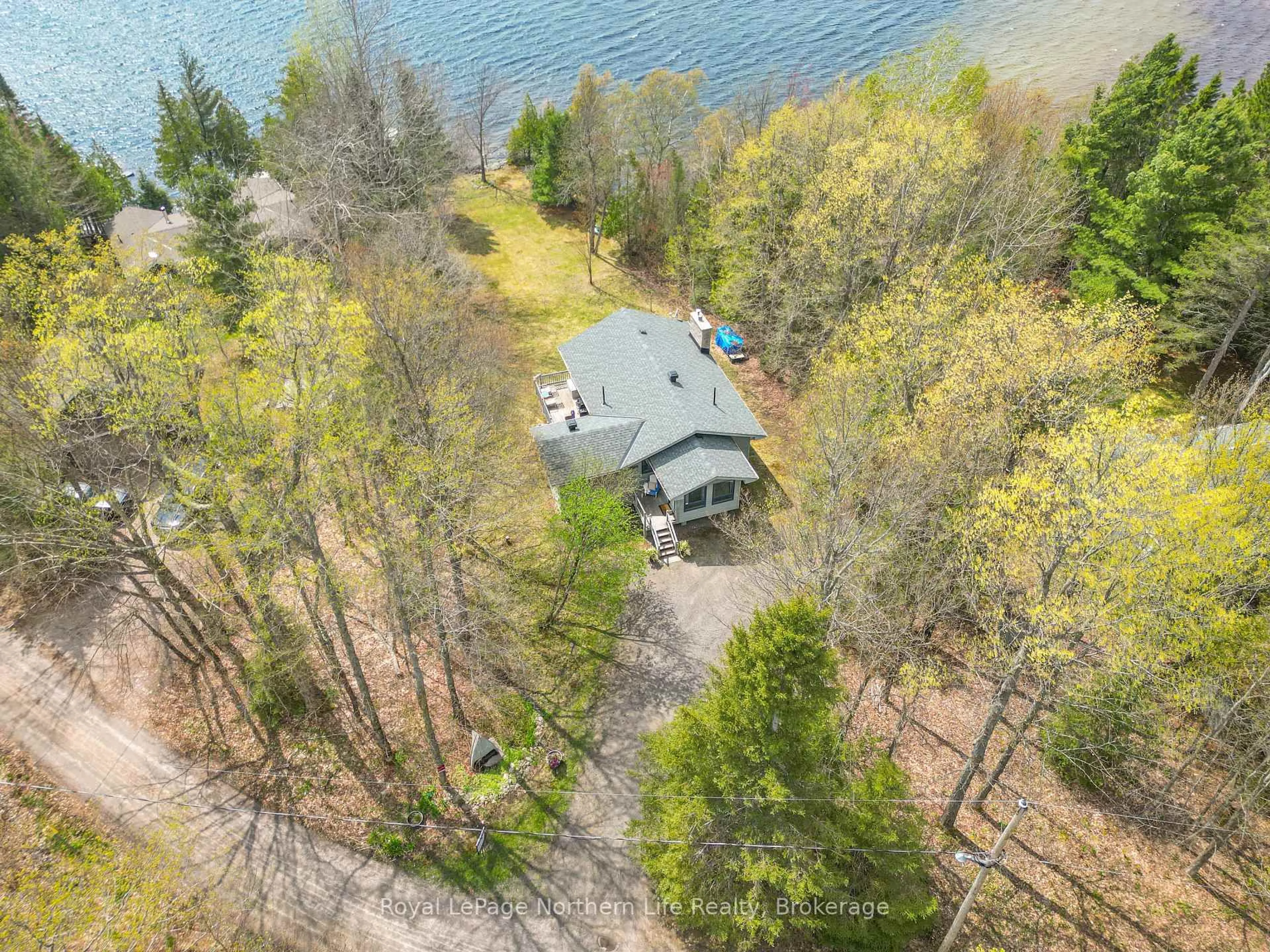 A pic from outside/outdoor area/front of a property/back of a property/a pic from drone, water/lake/river/ocean view for 133 Harrison Rd, Nipissing Ontario P0H 1W0