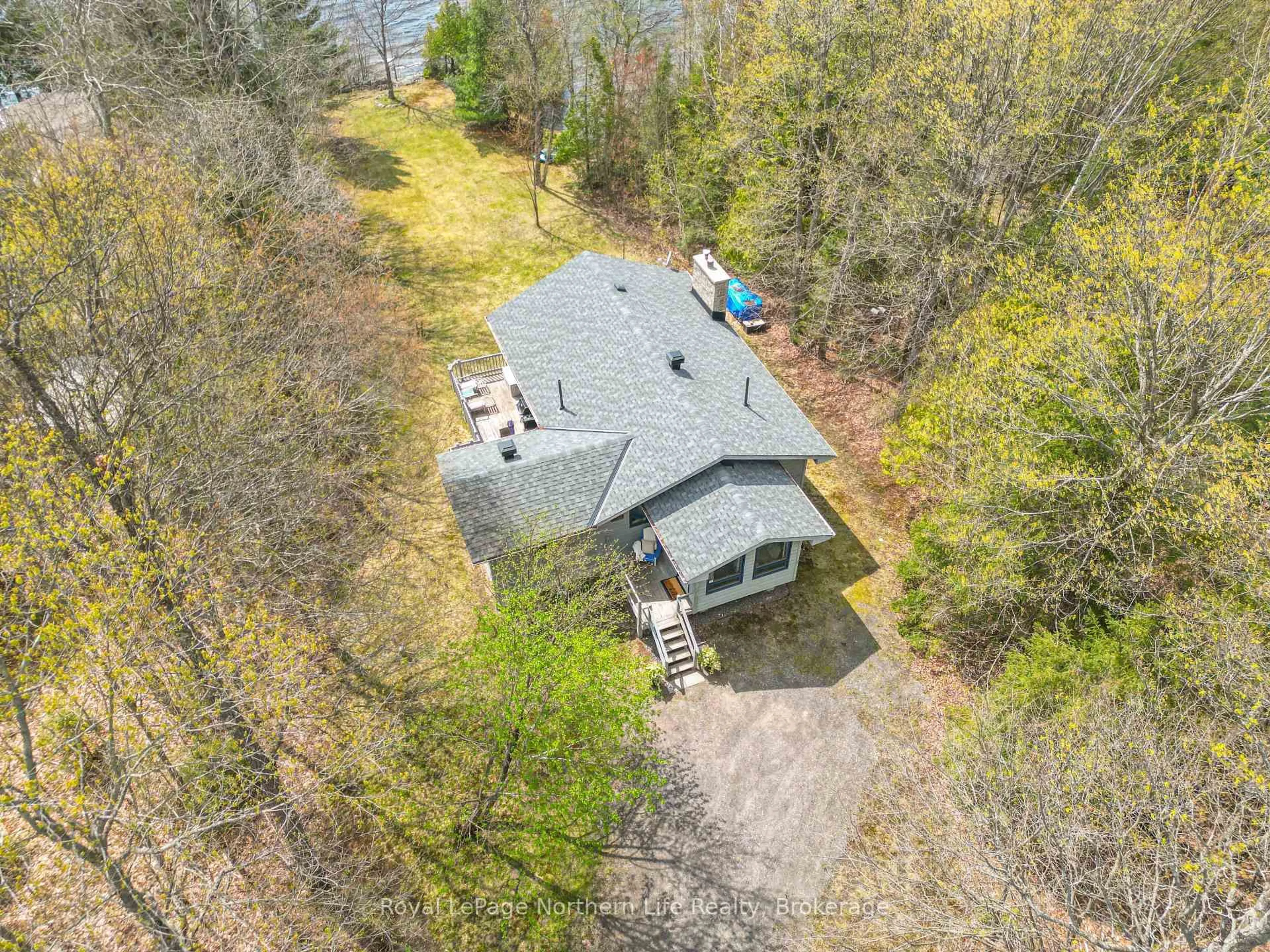 A pic from outside/outdoor area/front of a property/back of a property/a pic from drone, water/lake/river/ocean view for 133 Harrison Rd, Nipissing Ontario P0H 1W0