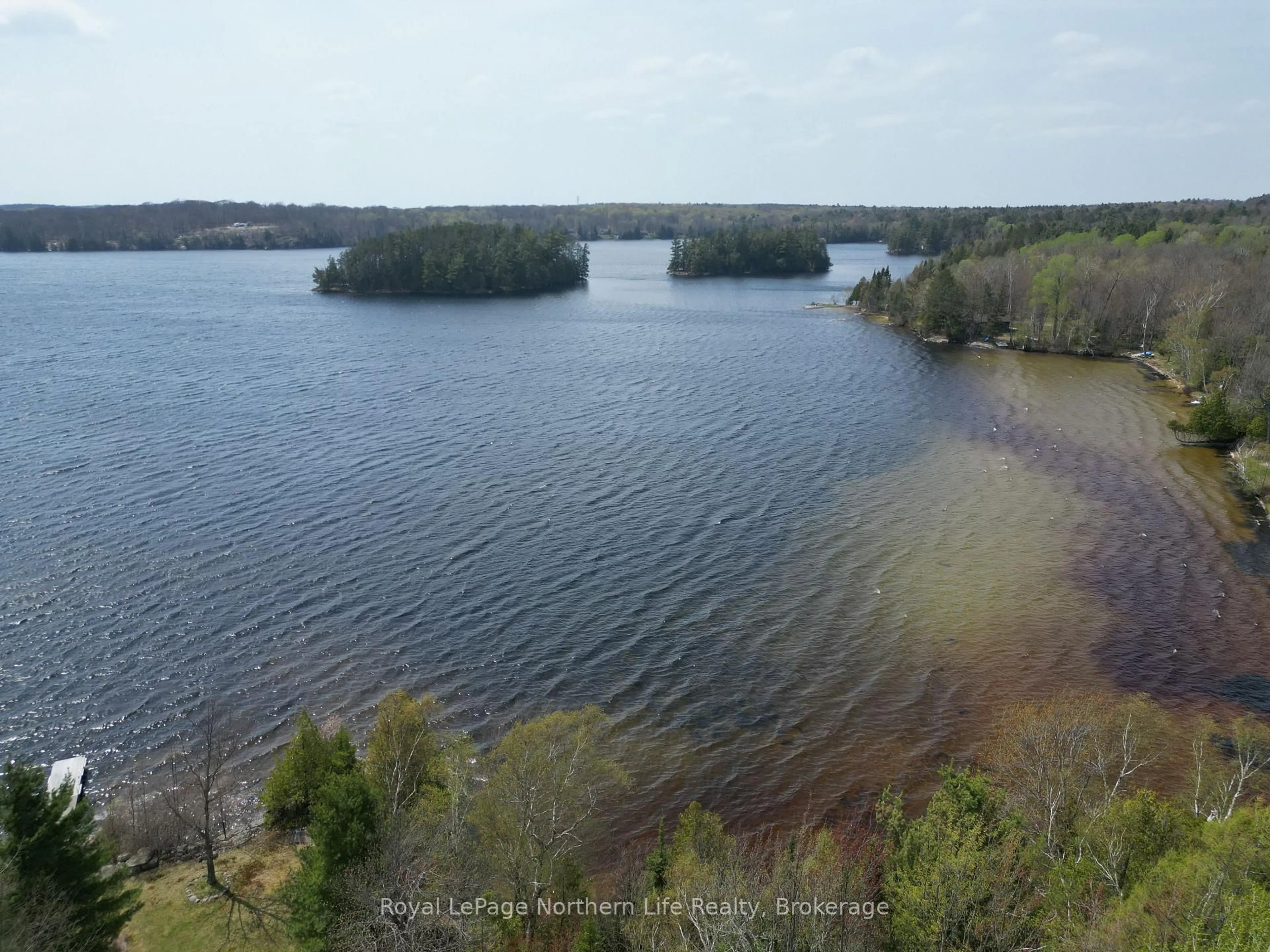 A pic from outside/outdoor area/front of a property/back of a property/a pic from drone, water/lake/river/ocean view for 133 Harrison Rd, Nipissing Ontario P0H 1W0