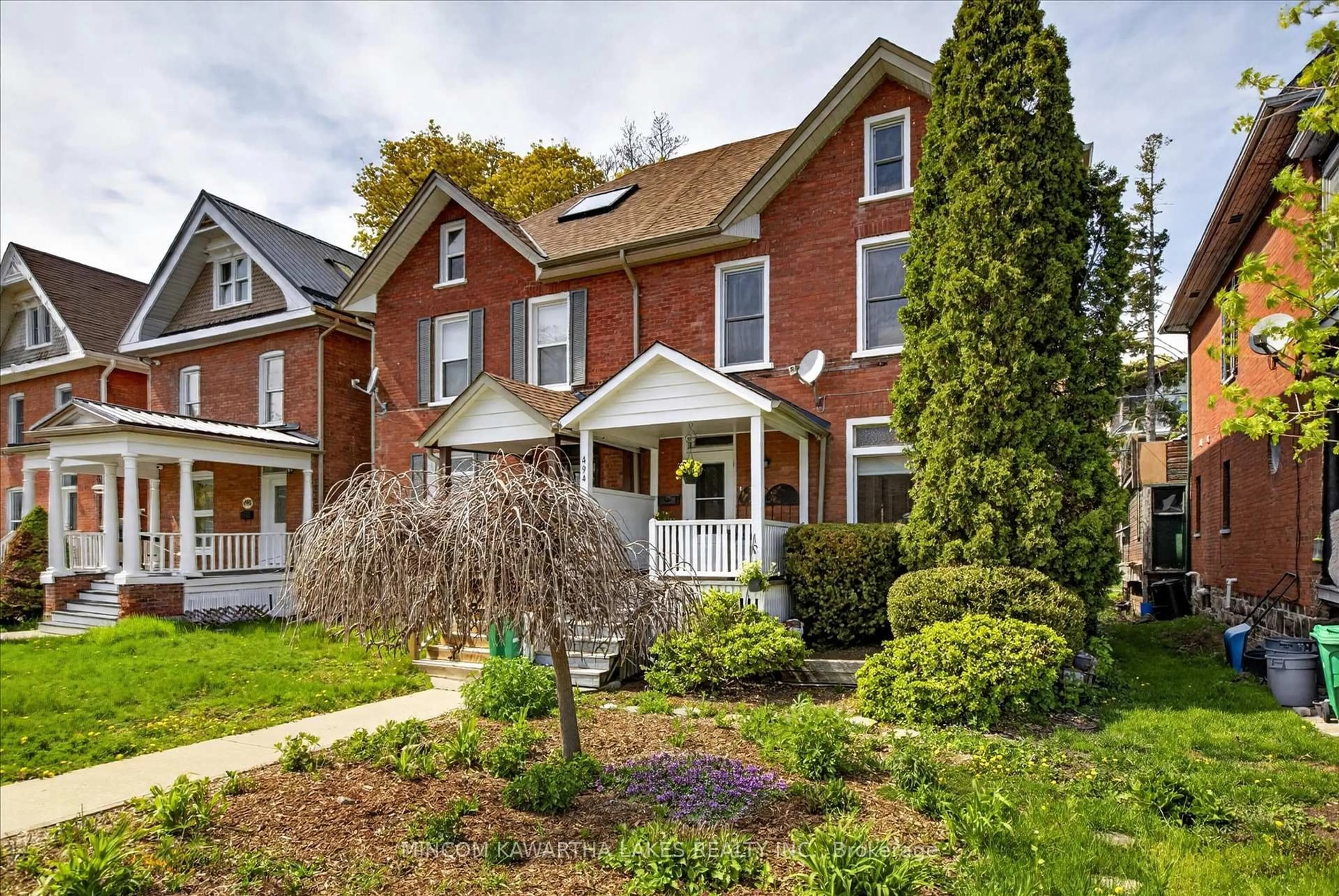 Home with brick exterior material, street for 494 Charlotte St, Peterborough Ontario K9J 2W3