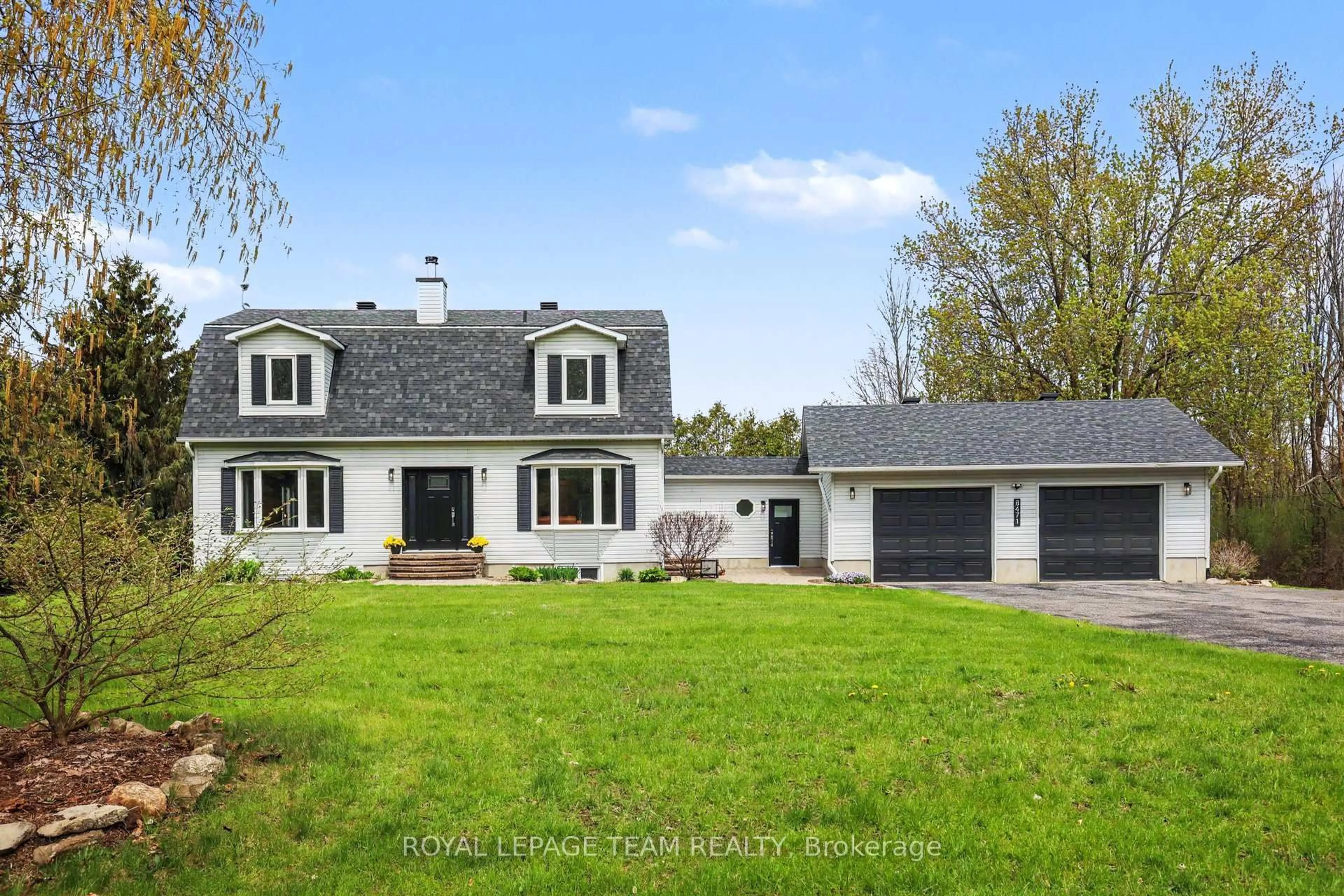 Home with vinyl exterior material, street for 8471 Marionville Rd, Winchester Ontario K0C 2K0