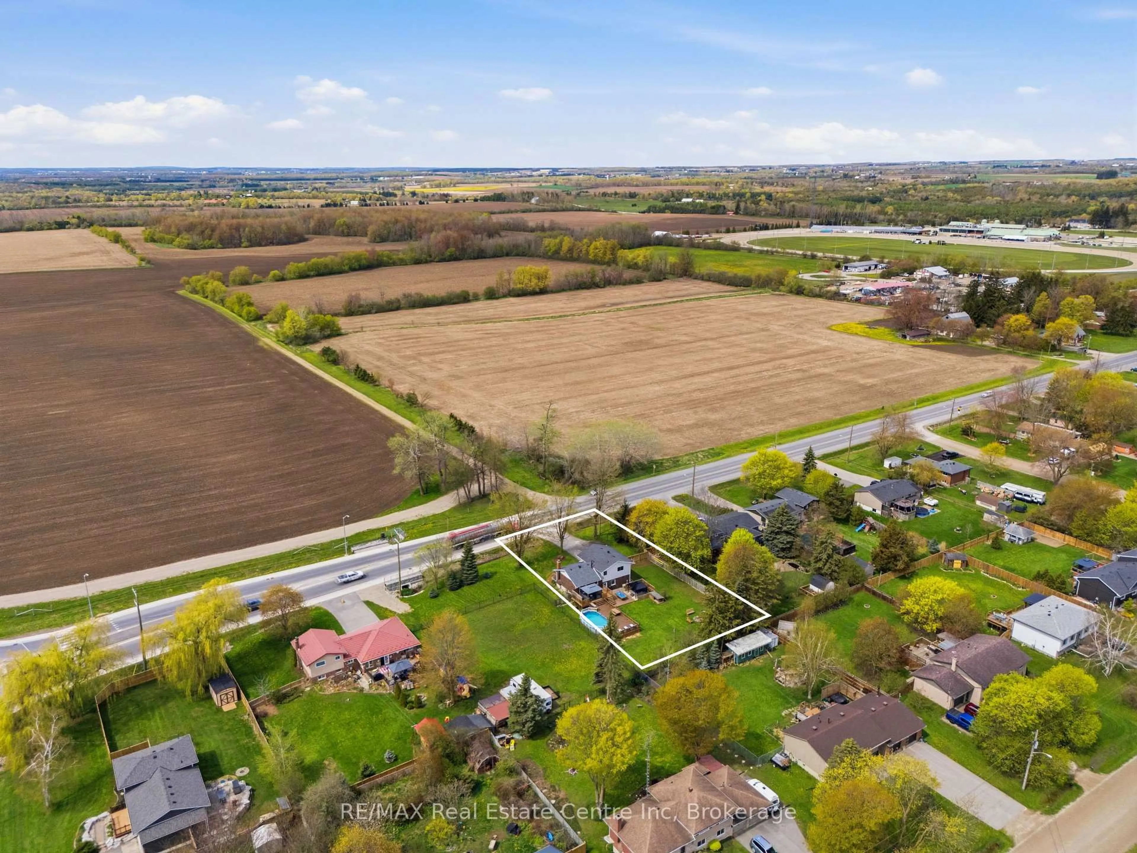 A pic from outside/outdoor area/front of a property/back of a property/a pic from drone, street for 160 Wellington Road 7, Centre Wellington Ontario N0B 1S0
