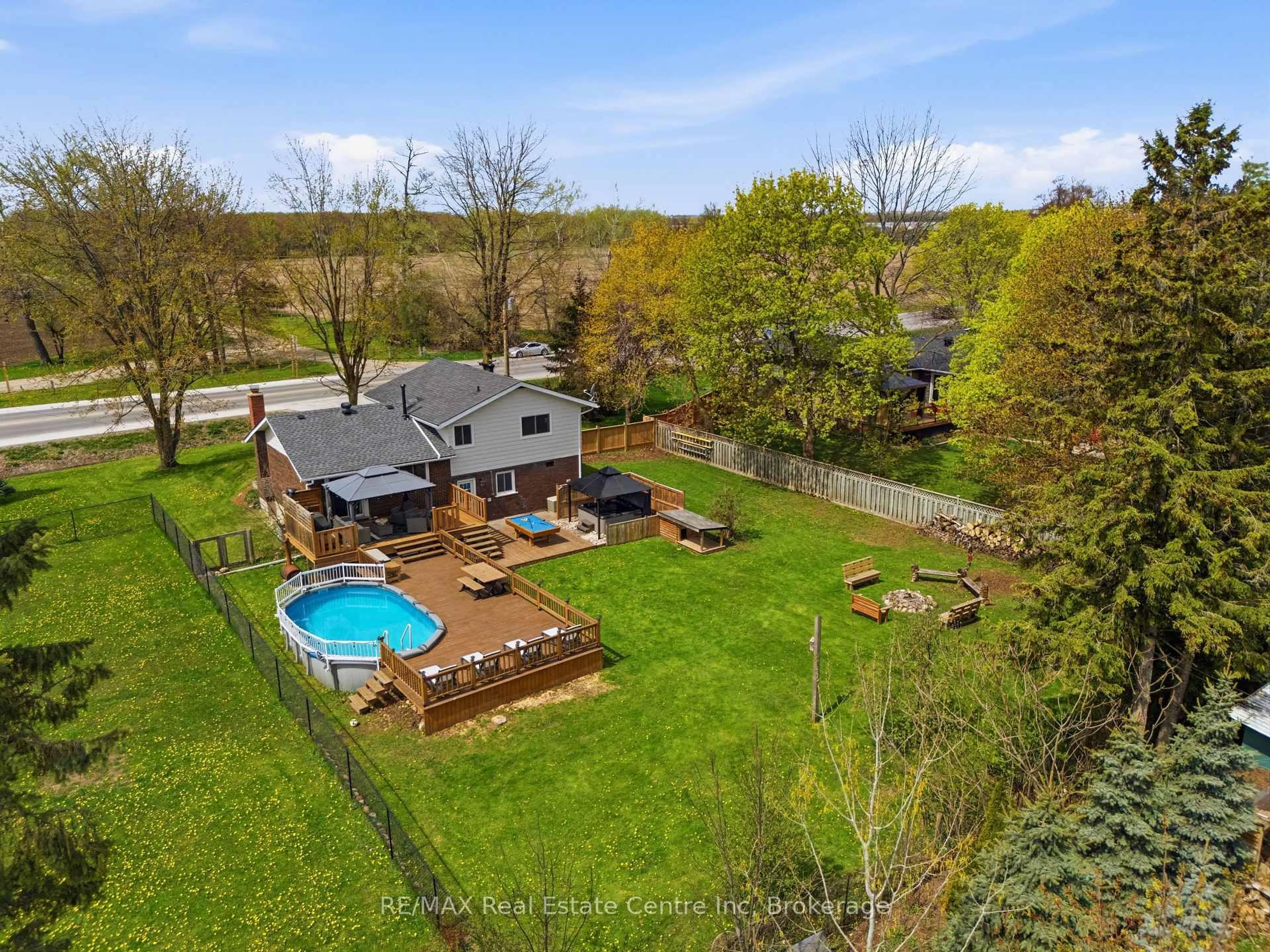 A pic from outside/outdoor area/front of a property/back of a property/a pic from drone, water/lake/river/ocean view for 160 Wellington Road 7, Centre Wellington Ontario N0B 1S0
