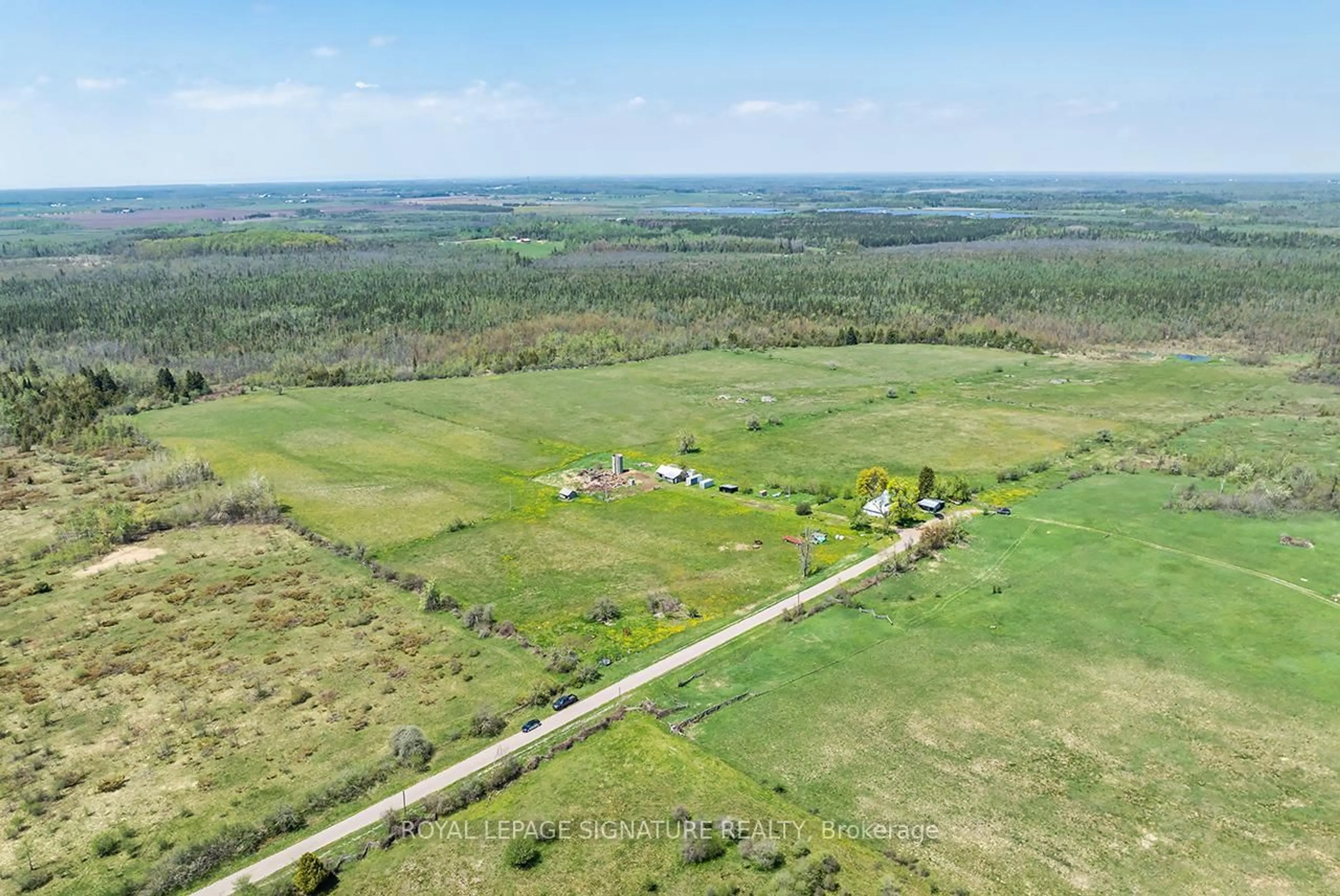 A pic from outside/outdoor area/front of a property/back of a property/a pic from drone, forest/trees view for 1007 Moor Rd, Kawartha Lakes Ontario K0M 2T0