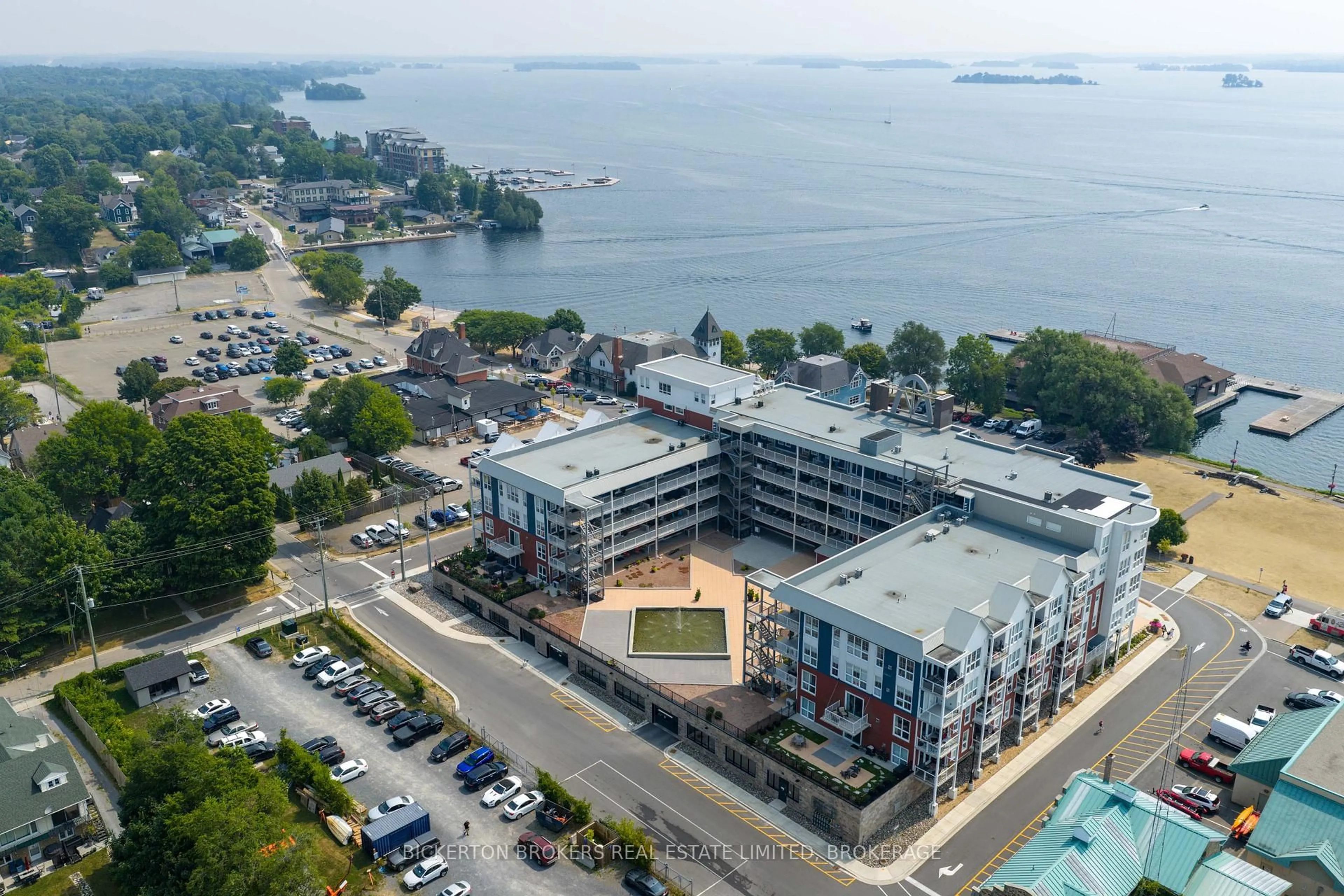 A pic from outside/outdoor area/front of a property/back of a property/a pic from drone, water/lake/river/ocean view for 130 Water St #406, Gananoque Ontario K7G 0A8