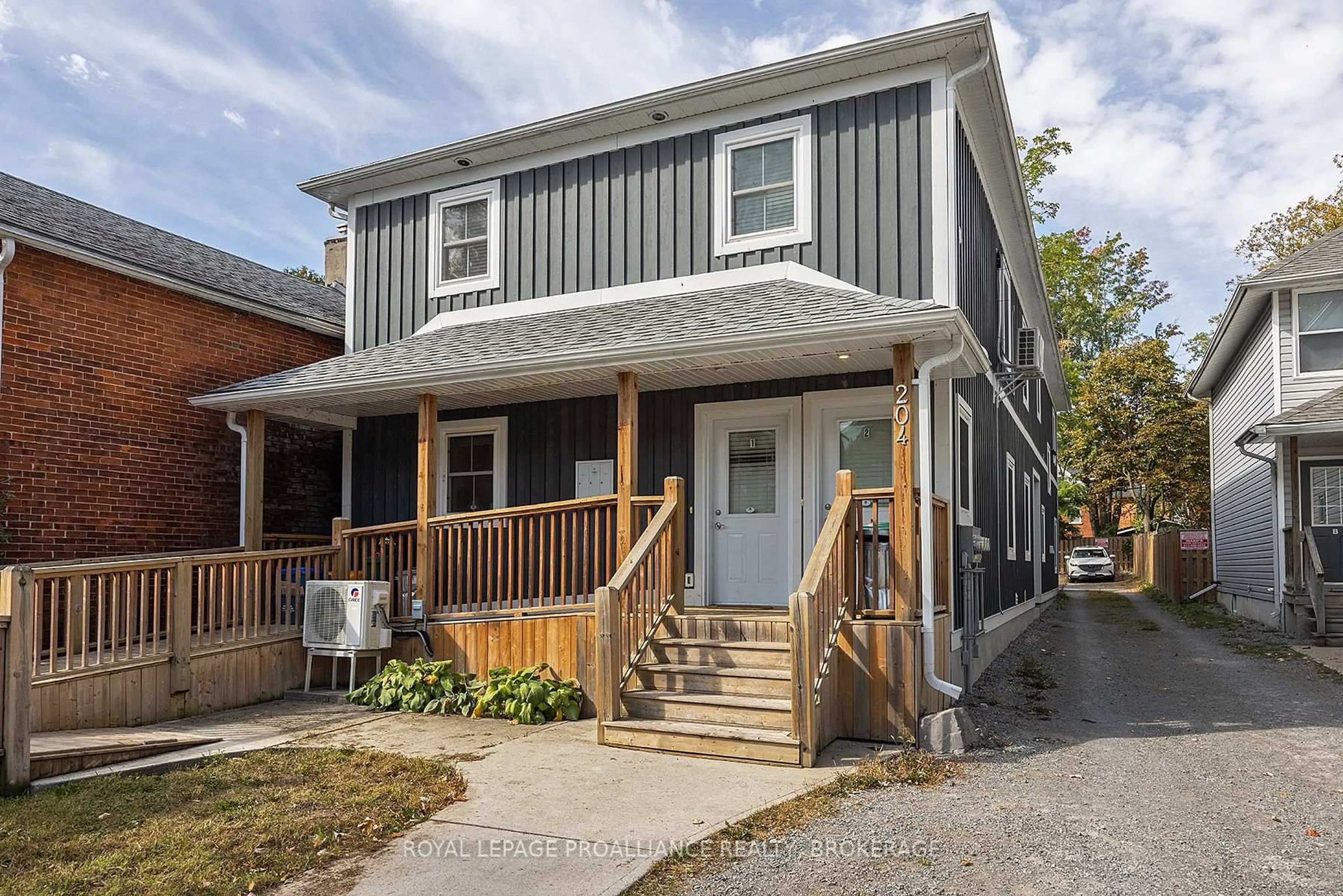 Home with vinyl exterior material, street for 204 Alfred St, Kingston Ontario K7L 3R9