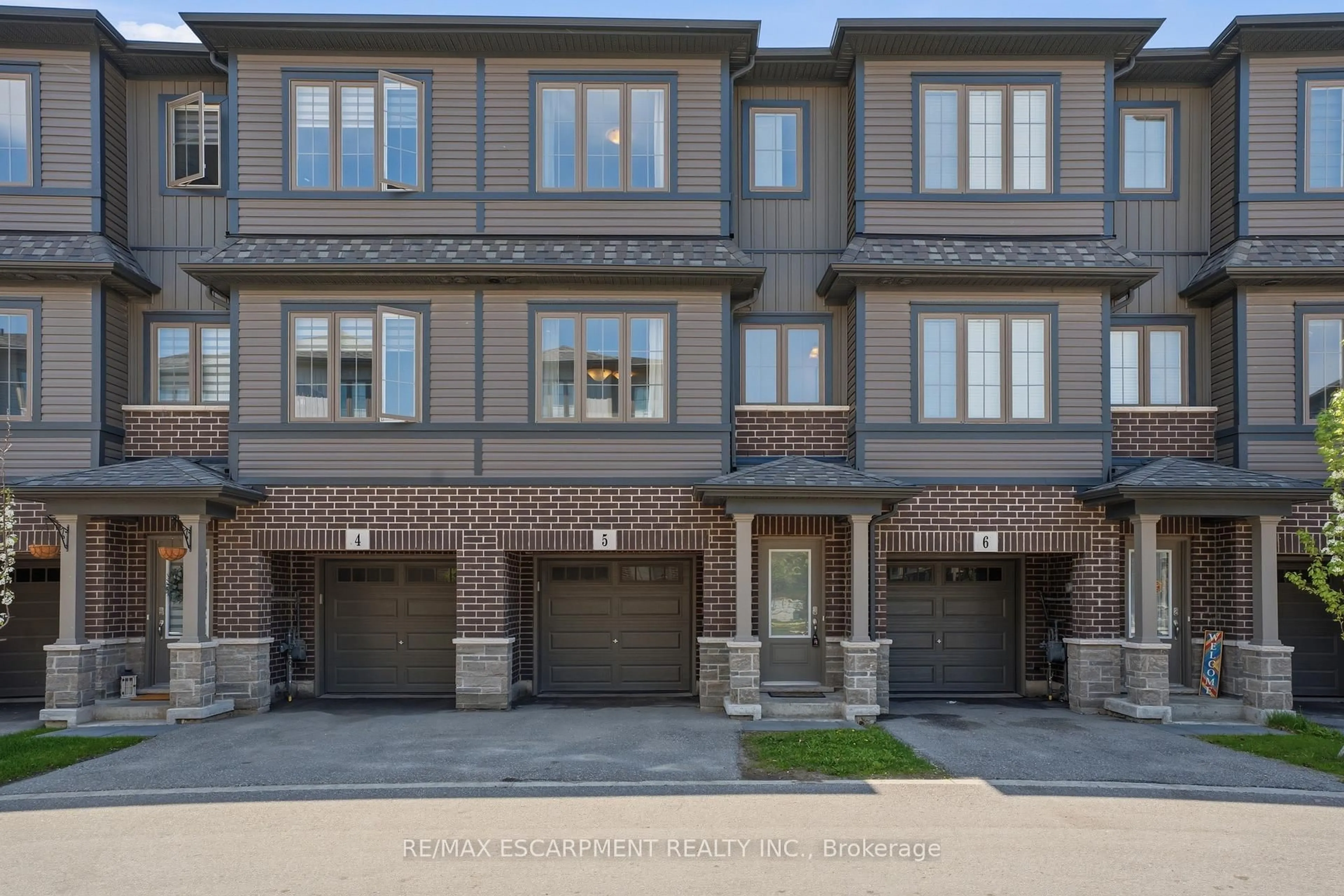 Home with brick exterior material, street for 124 Compass Tr #Unit 5, Cambridge Ontario N3E 0E3
