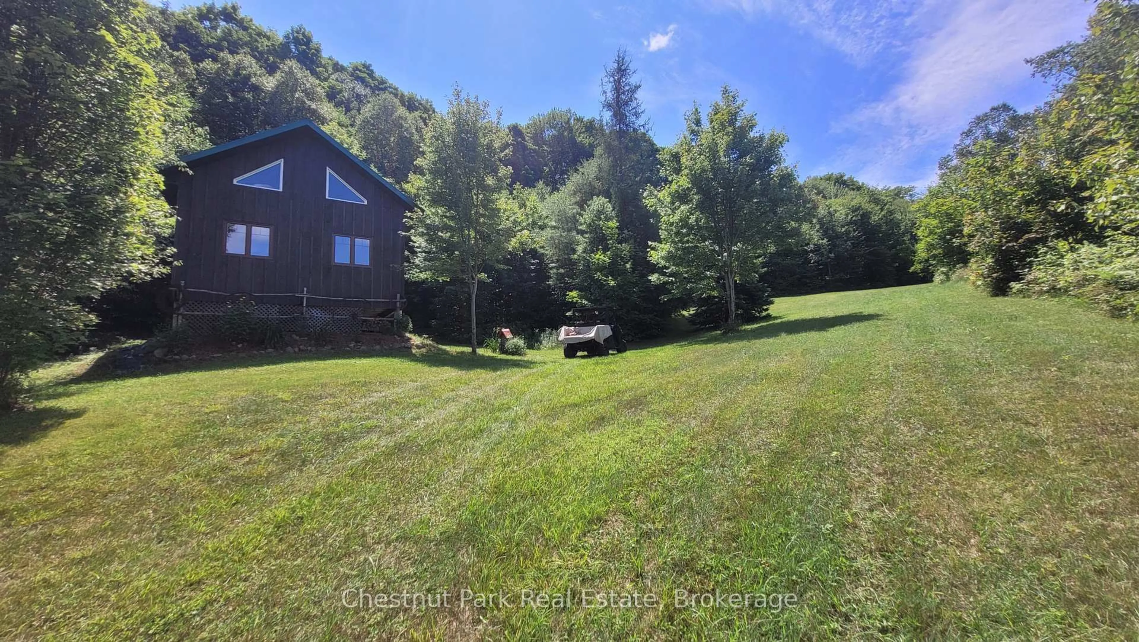 A pic from outside/outdoor area/front of a property/back of a property/a pic from drone, water/lake/river/ocean view for 1060 BAKER Sdrd, Bracebridge Ontario P1L 1W9