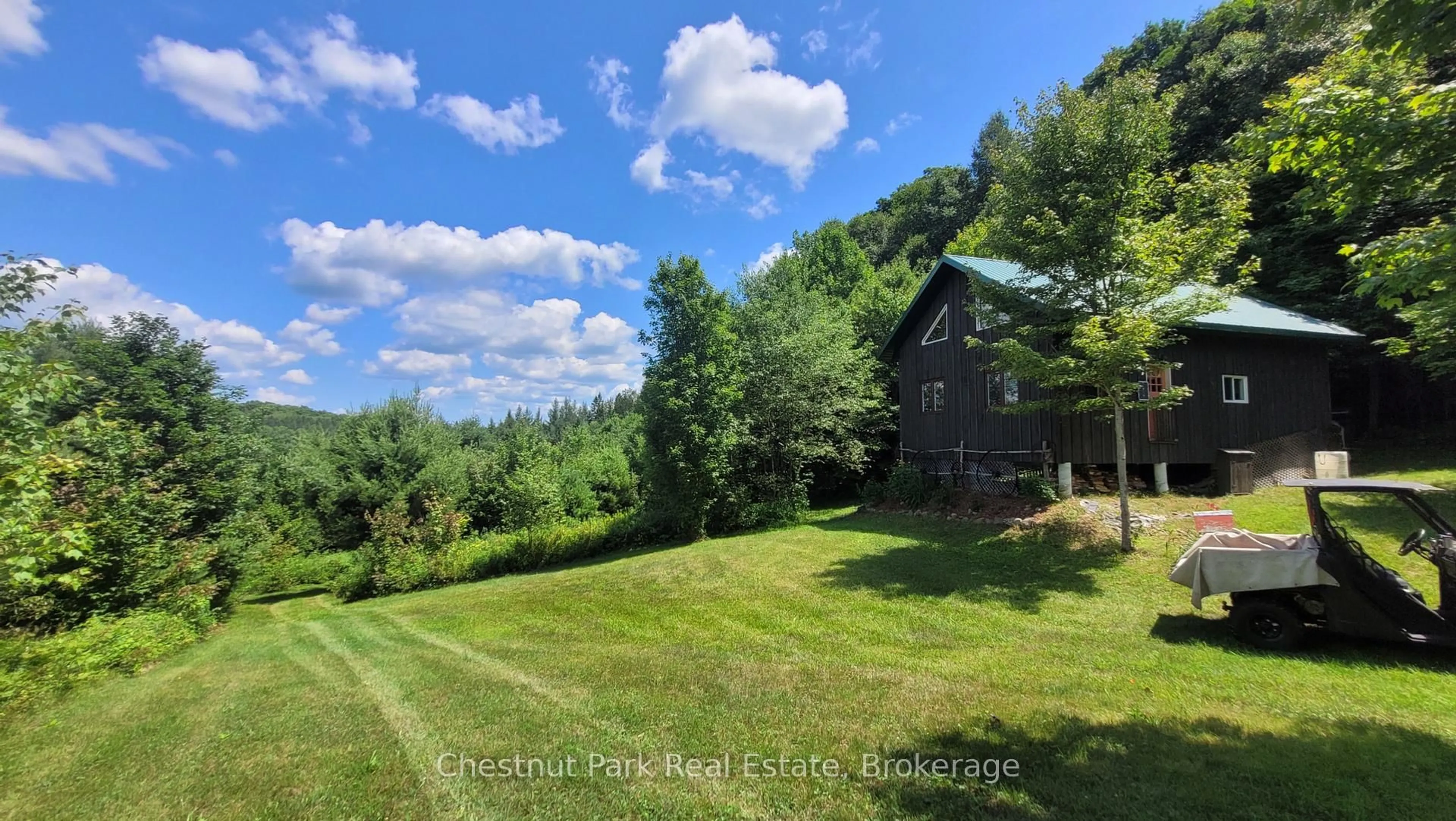 A pic from outside/outdoor area/front of a property/back of a property/a pic from drone, water/lake/river/ocean view for 1060 BAKER Sdrd, Bracebridge Ontario P1L 1W9