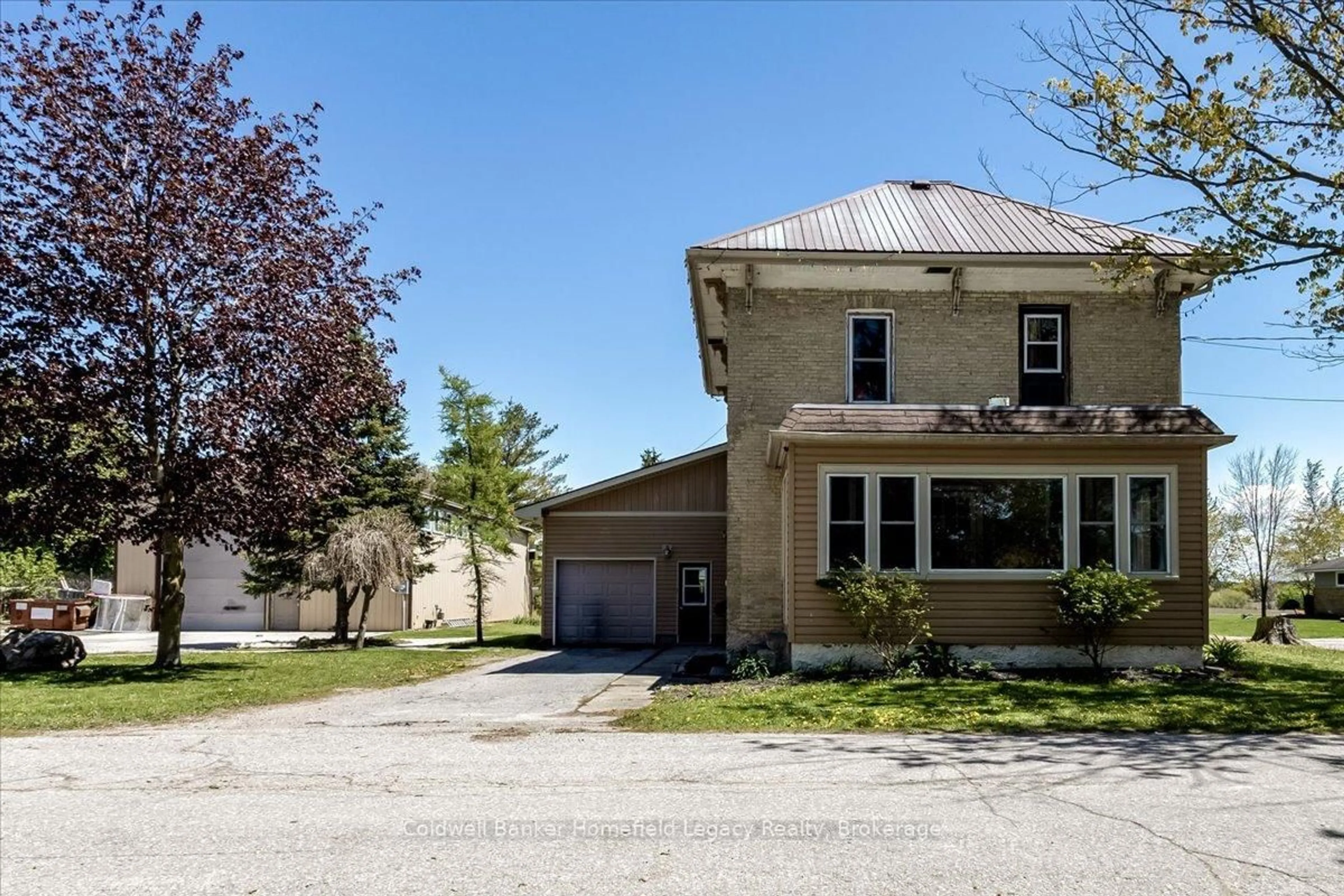 A pic from outside/outdoor area/front of a property/back of a property/a pic from drone, street for 148 Church Ave, South Huron Ontario N0M 1N0