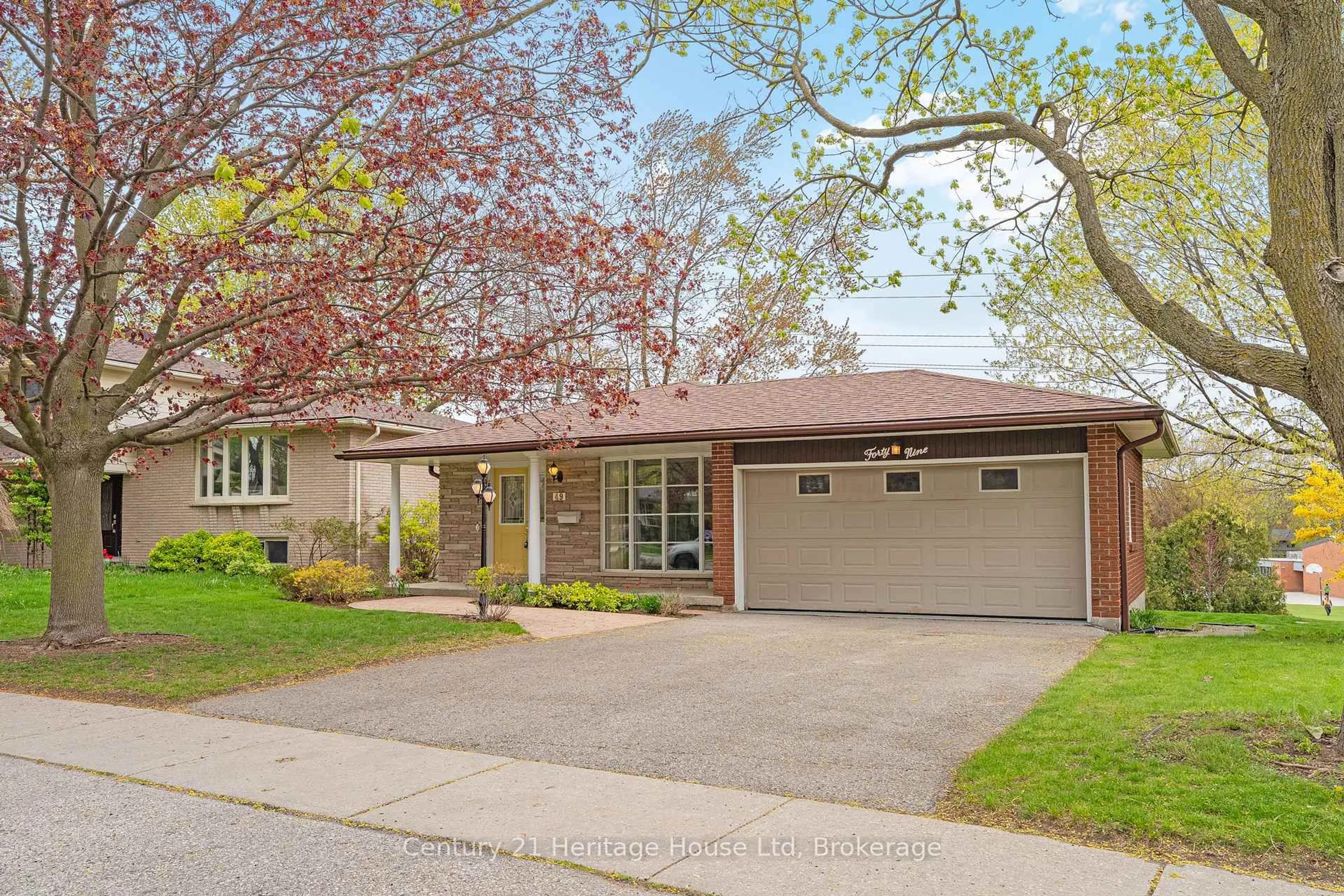 Home with brick exterior material, street for 49 Vanier Dr, Guelph Ontario N1G 2K9