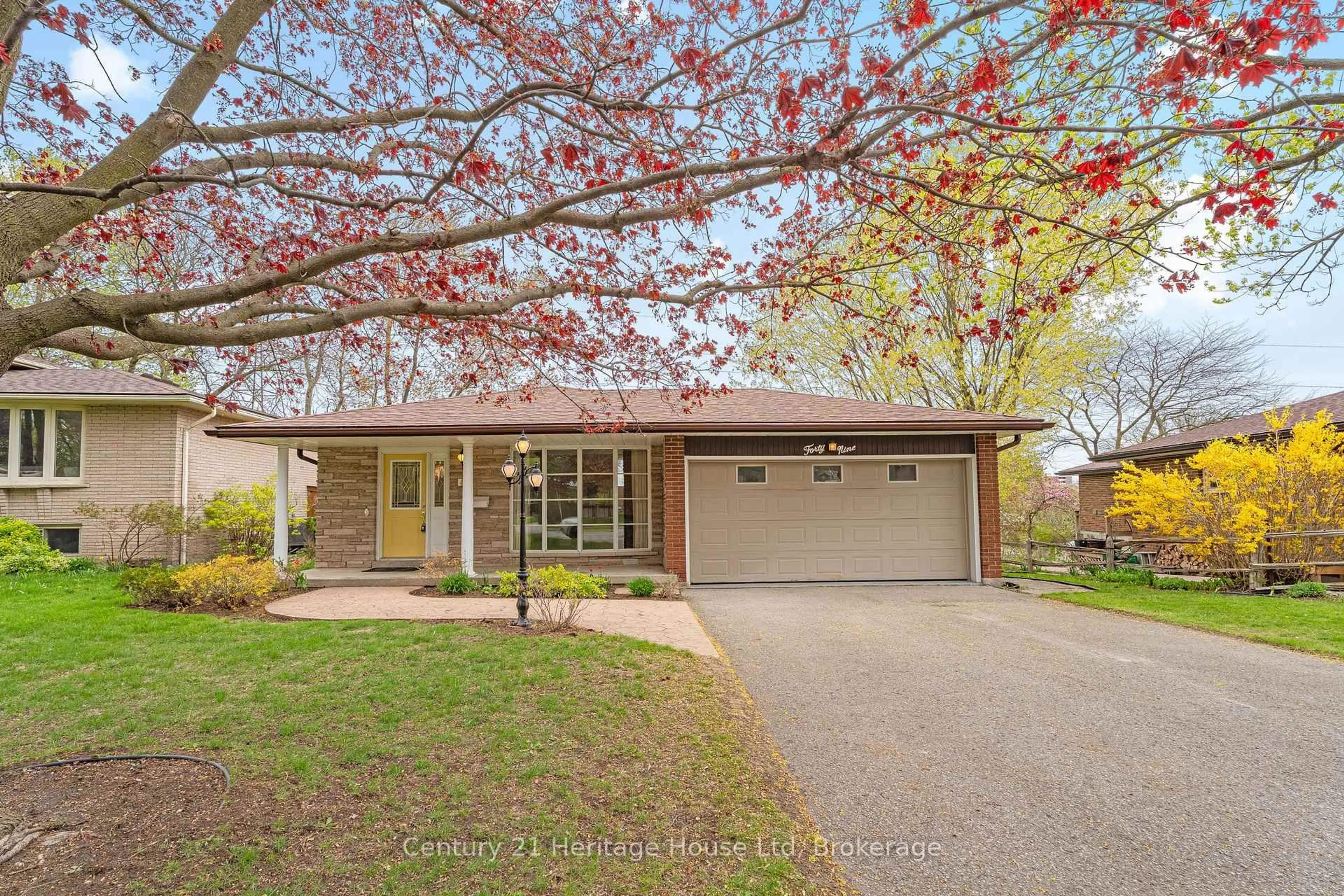Home with vinyl exterior material, street for 49 Vanier Dr, Guelph Ontario N1G 2K9