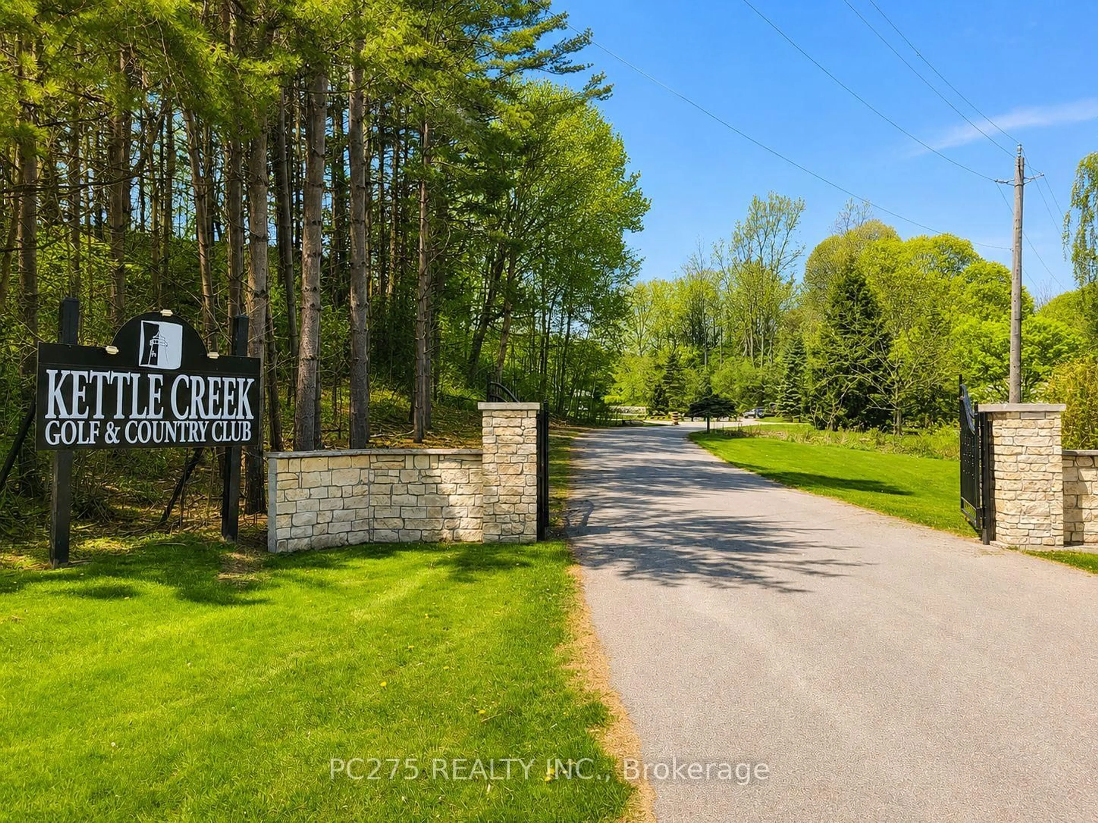 A pic from outside/outdoor area/front of a property/back of a property/a pic from drone, forest/trees view for 301 Carlow Rd #24, Central Elgin Ontario N5L 1B7
