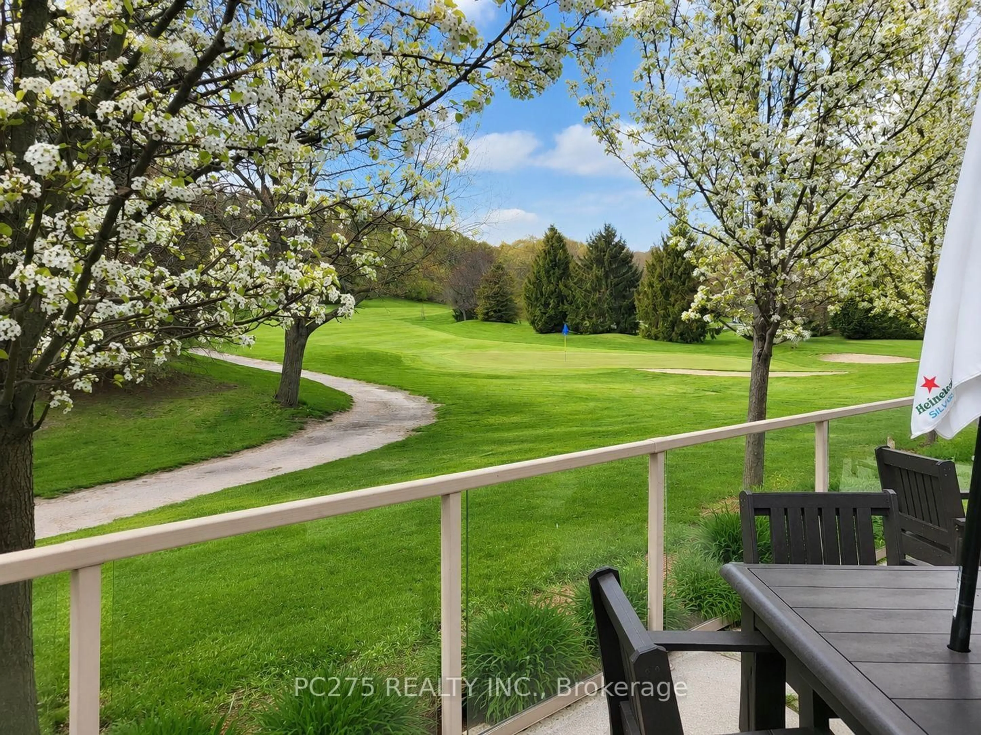 A pic from outside/outdoor area/front of a property/back of a property/a pic from drone, forest/trees view for 301 Carlow Rd #24, Central Elgin Ontario N5L 1B7