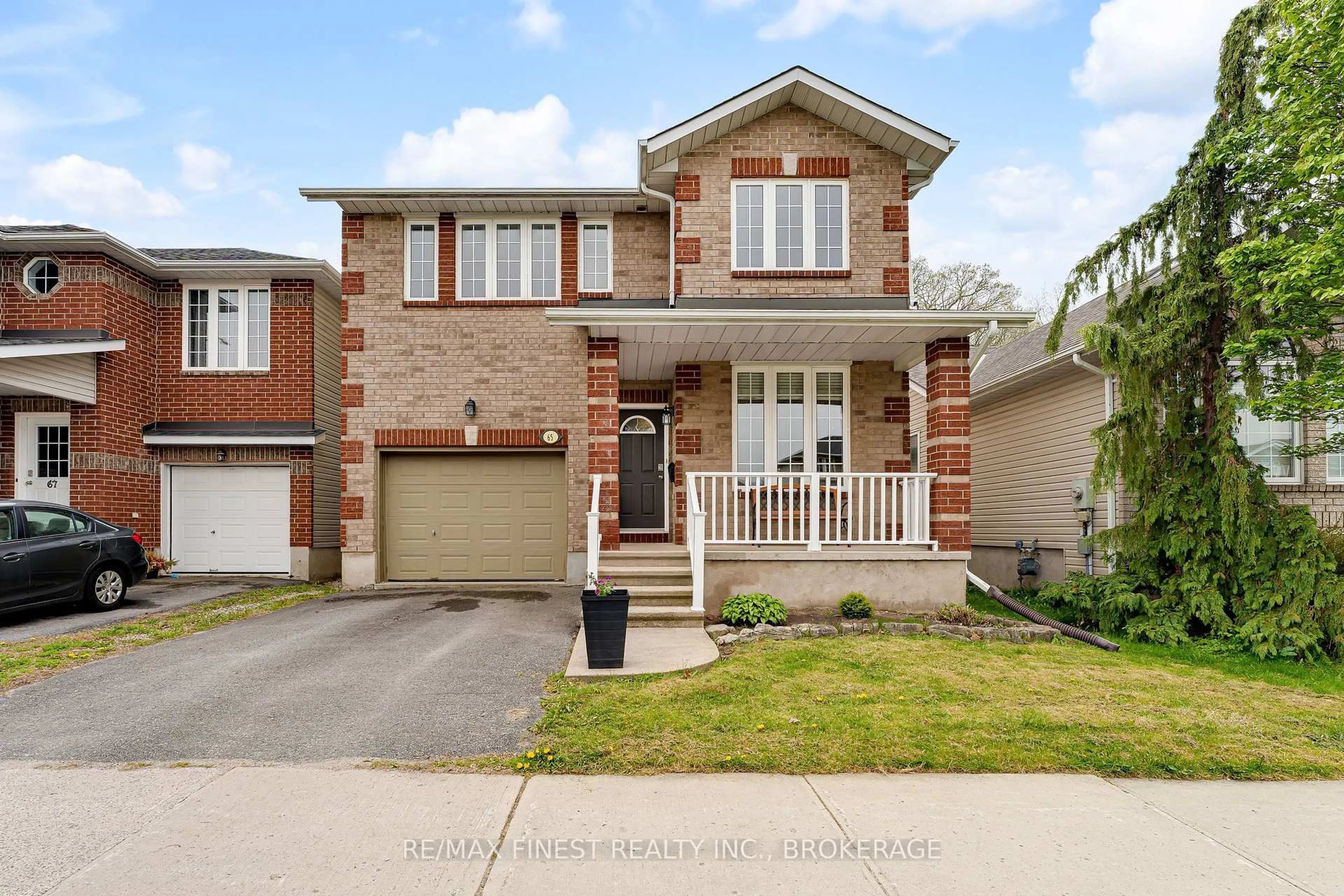 Home with brick exterior material, street for 65 Schooner Dr, Kingston Ontario K7K 7K1