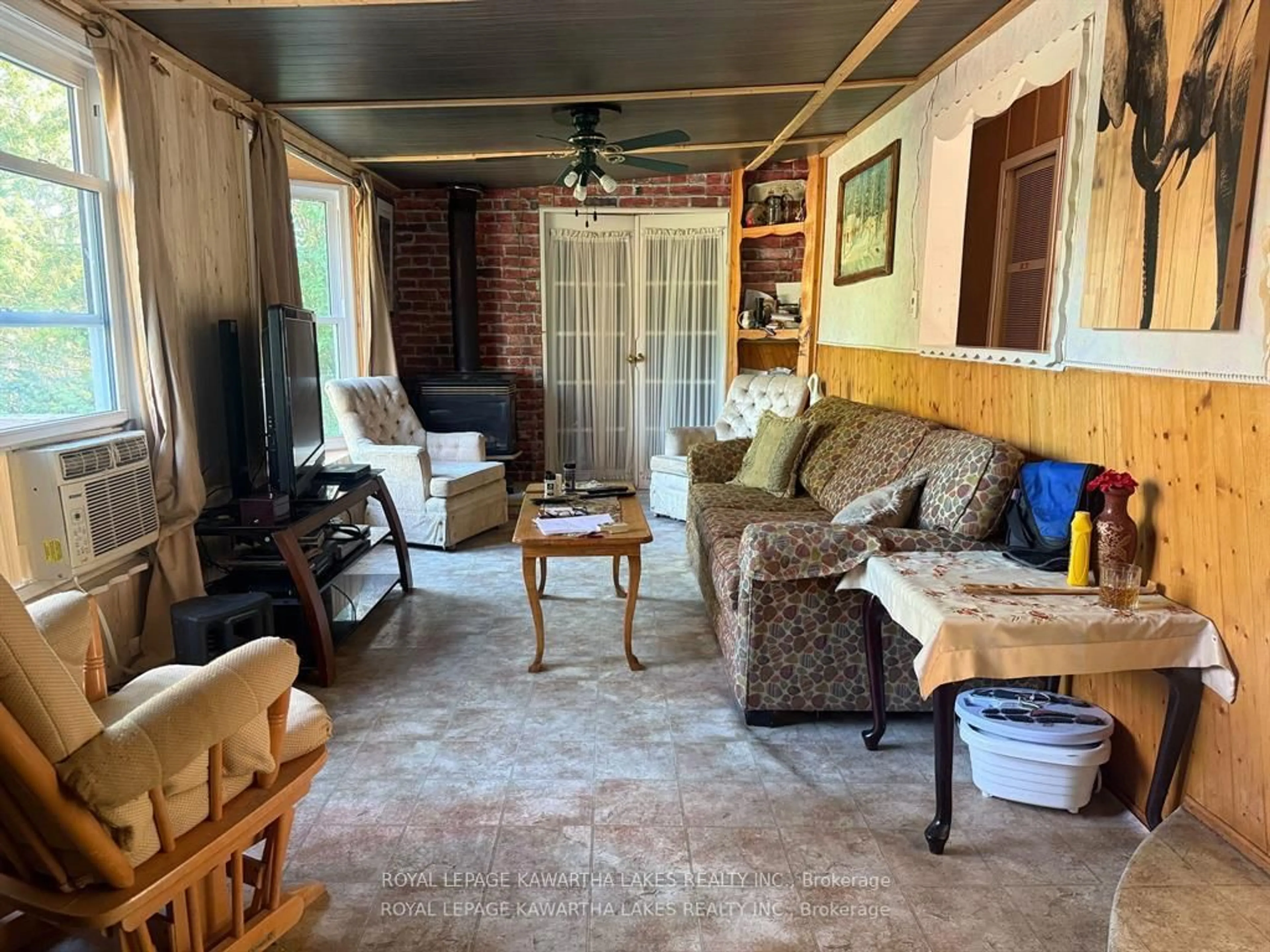 Living room with furniture, unknown for 1802 County Road 121 Rd #Unit 303, Kawartha Lakes Ontario K0M 1N0