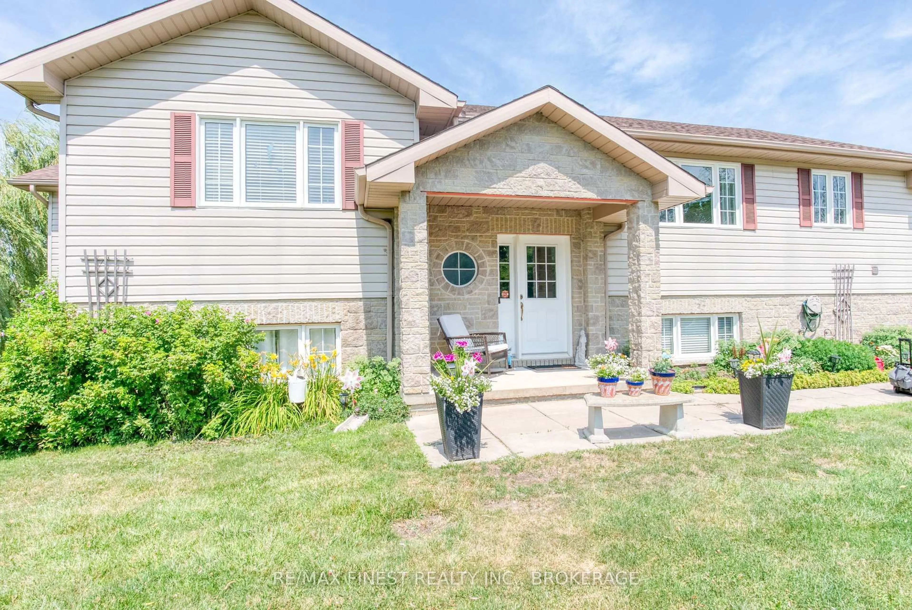 Home with vinyl exterior material, street for 6418 Sixth Concession Rd, Leeds and the Thousand Islands Ontario K0E 1A0