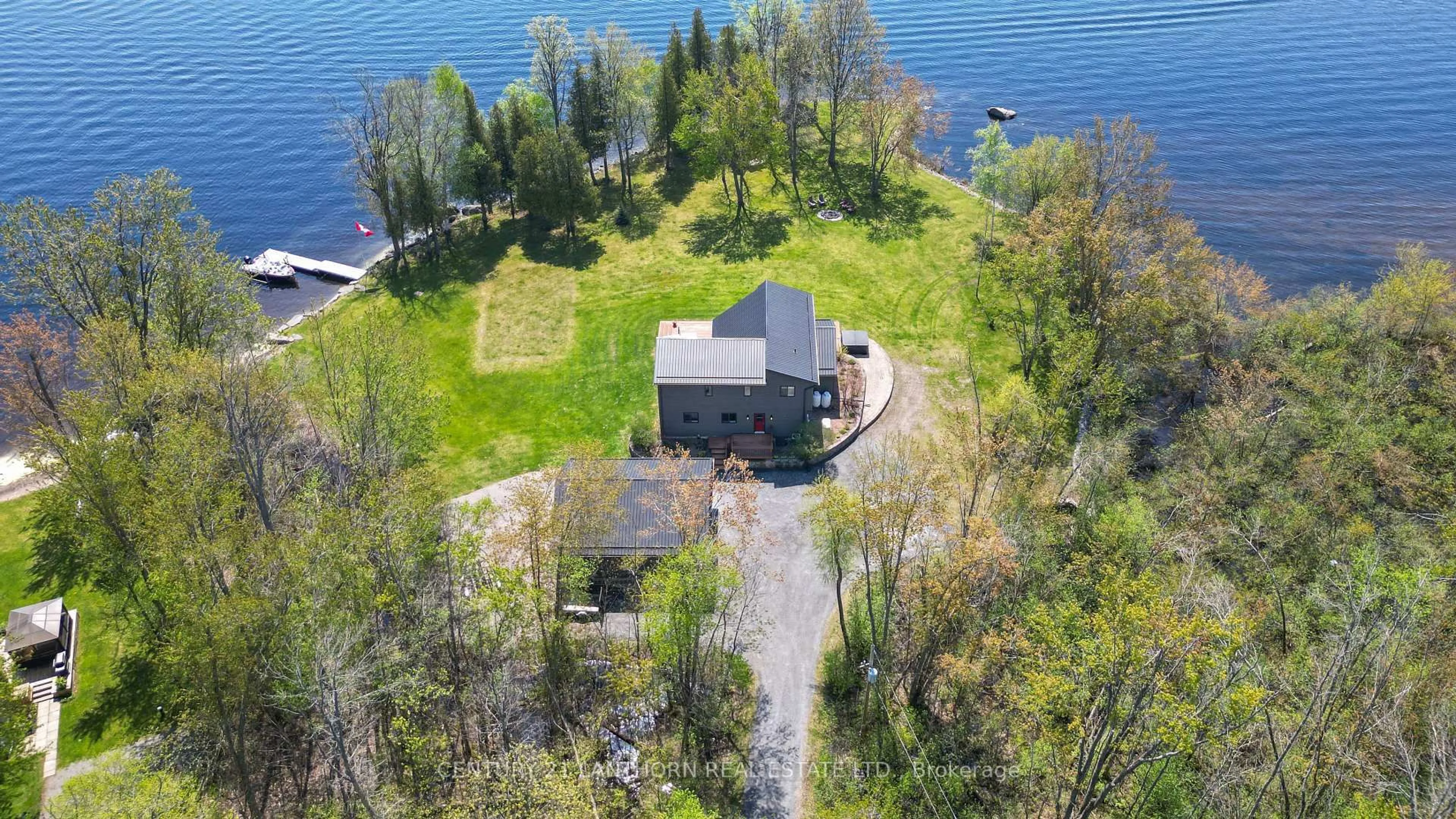 A pic from outside/outdoor area/front of a property/back of a property/a pic from drone, water/lake/river/ocean view for 1027 Cook Rd, Limoges Ontario K0K 2M0