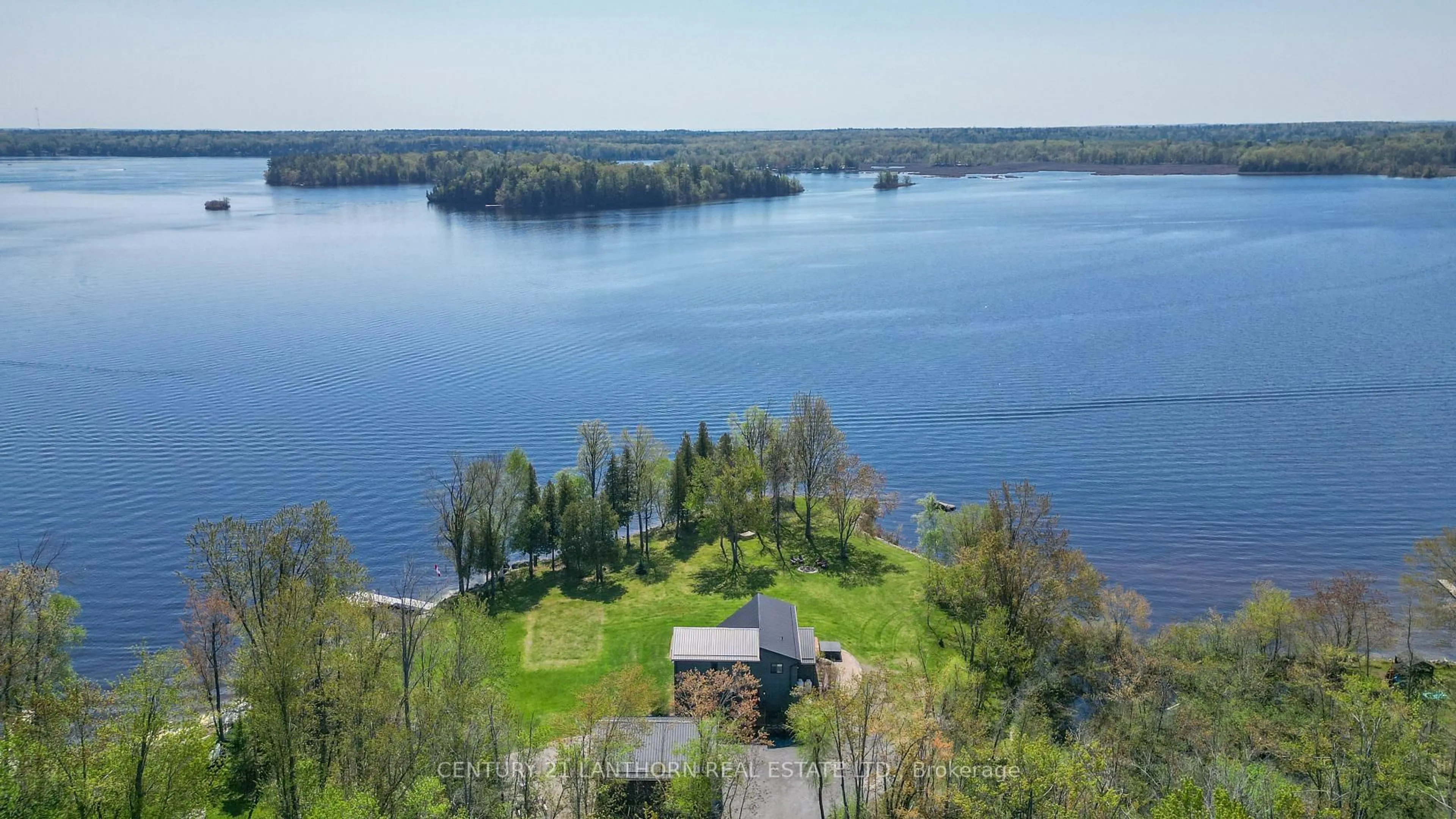 A pic from outside/outdoor area/front of a property/back of a property/a pic from drone, water/lake/river/ocean view for 1027 Cook Rd, Limoges Ontario K0K 2M0