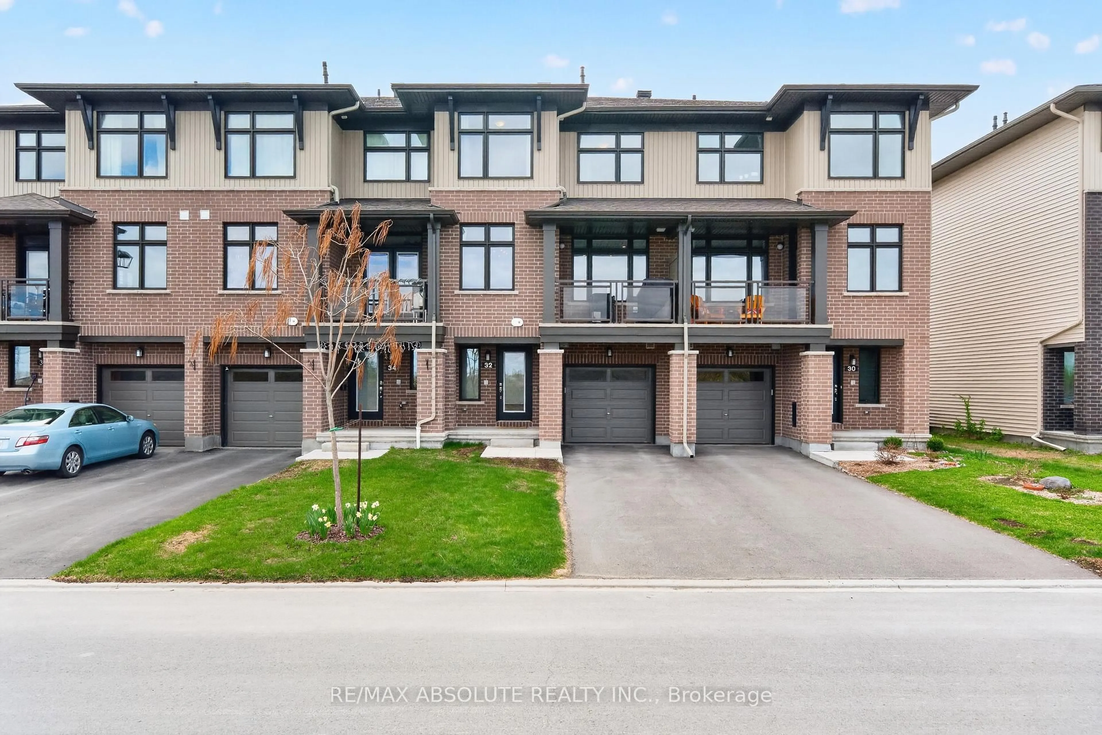 Home with brick exterior material, street for 32 Verglas Lane, Ottawa Ontario K1W 0P5