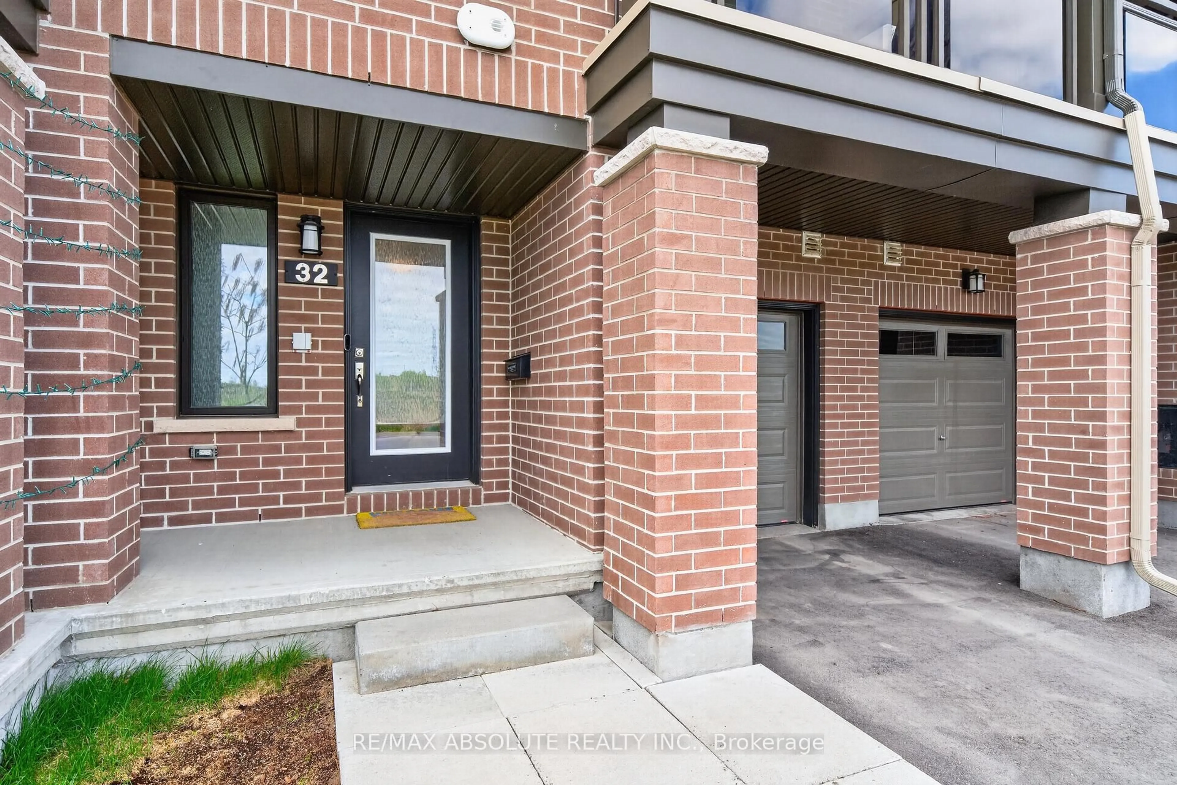 Home with brick exterior material, street for 32 Verglas Lane, Ottawa Ontario K1W 0P5