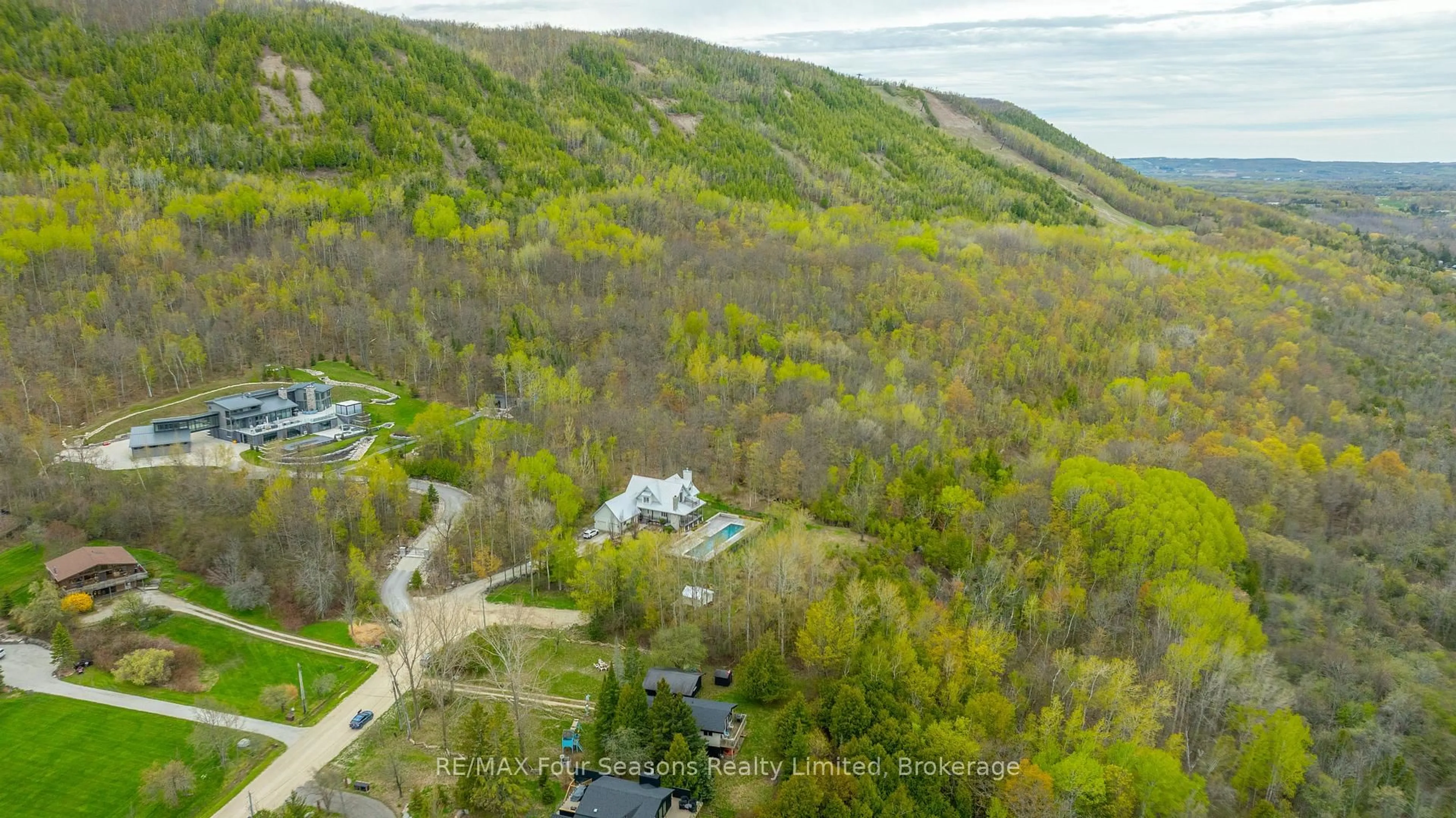 A pic from outside/outdoor area/front of a property/back of a property/a pic from drone, forest/trees view for 220 Hidden Lake Rd, Blue Mountains Ontario L9Y 0T6