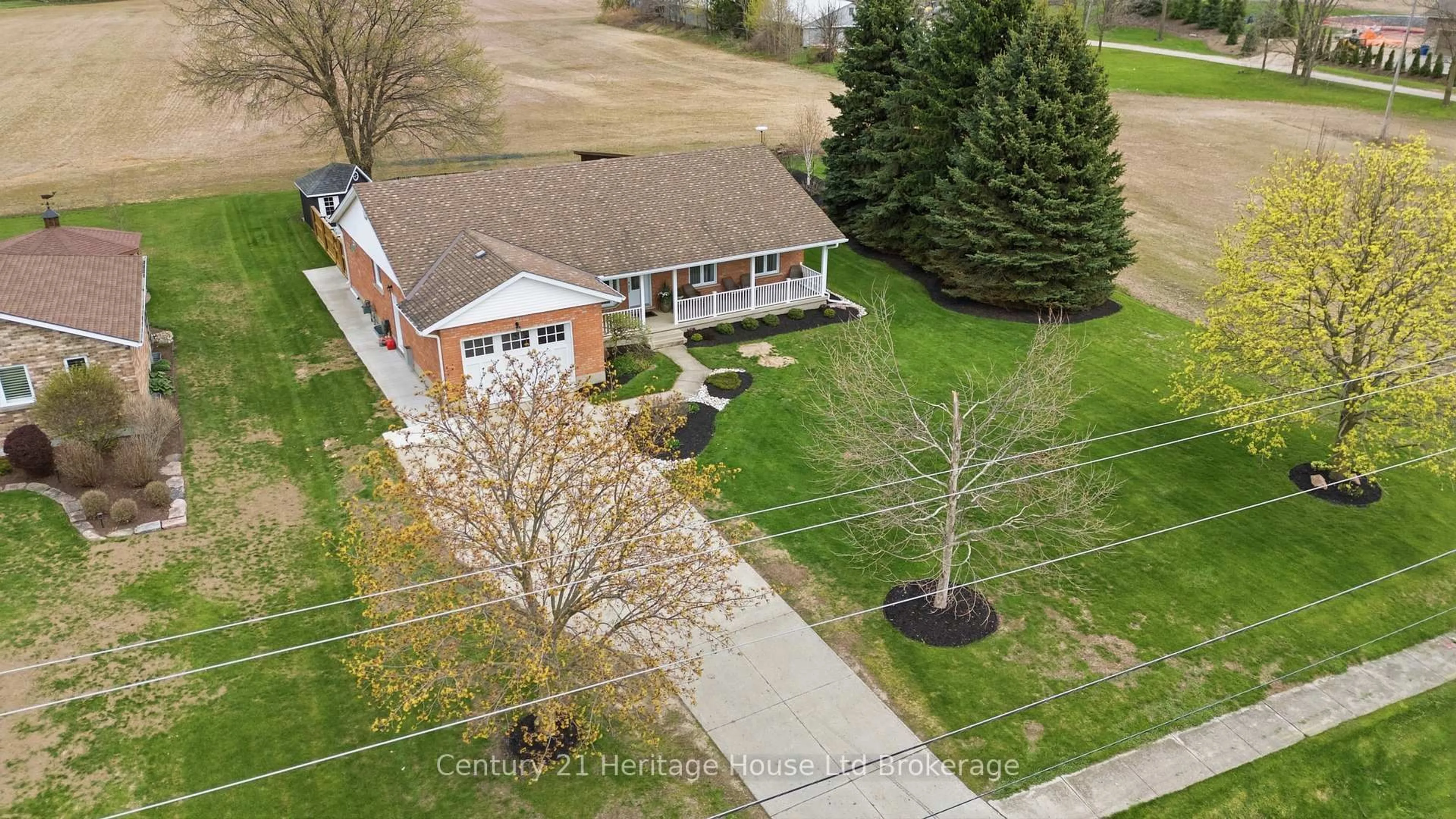 A pic from outside/outdoor area/front of a property/back of a property/a pic from drone, street for 116 Baird St, Blandford-Blenheim Ontario N0J 1B0