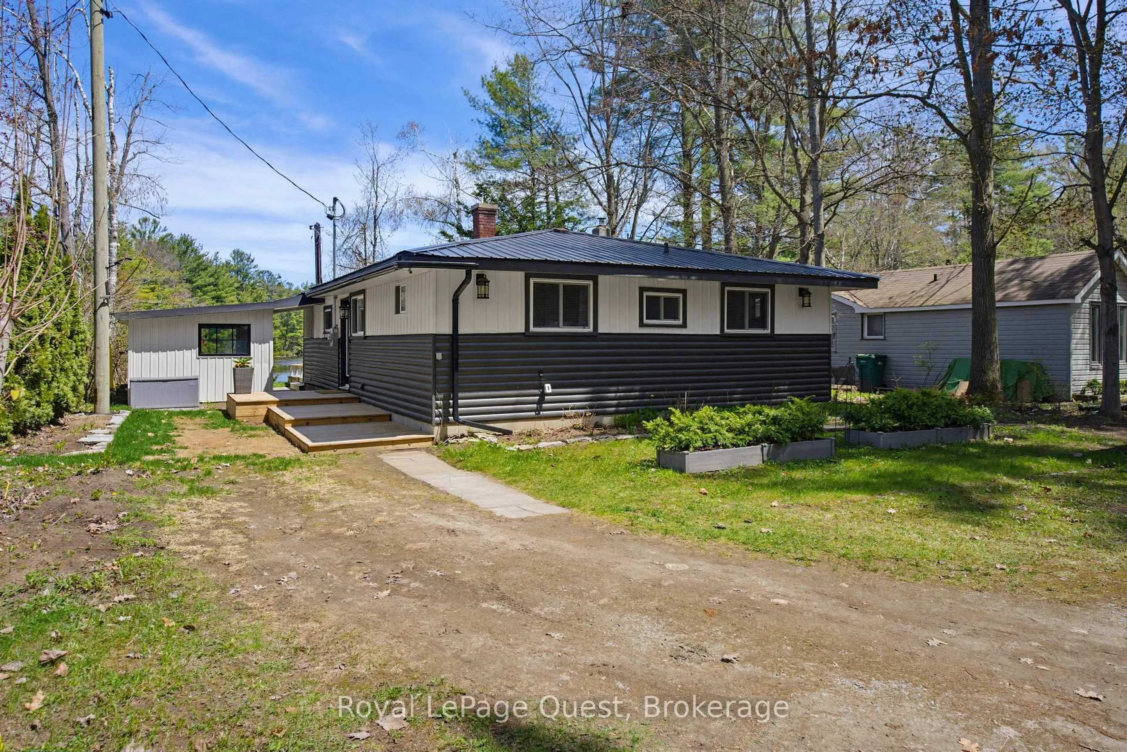A pic from outside/outdoor area/front of a property/back of a property/a pic from drone, street for 121 Stanley Rd, Kawartha Lakes Ontario K0M 2T0