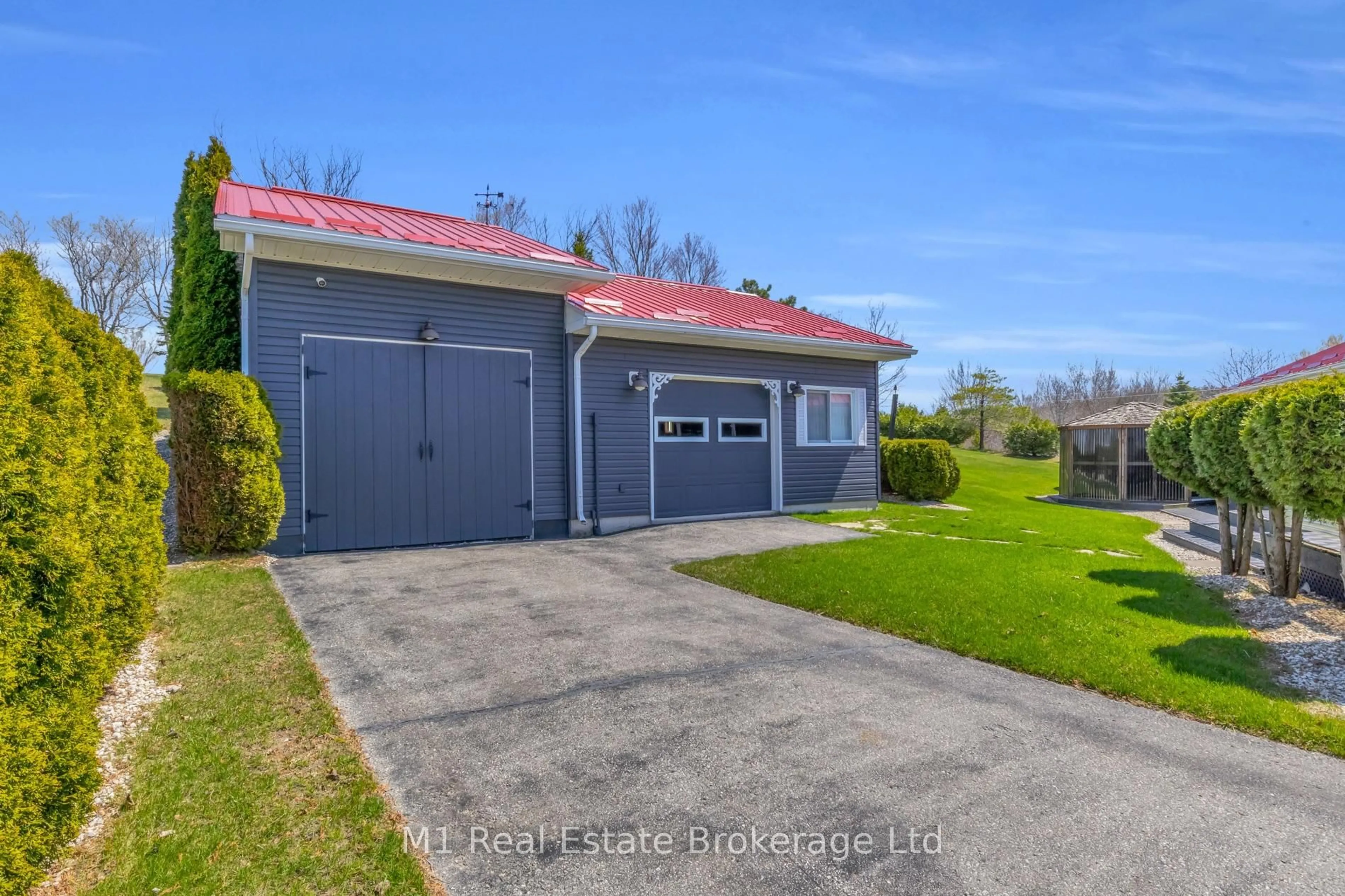 A pic from outside/outdoor area/front of a property/back of a property/a pic from drone, street for 2 Joanne Cres, Minto Ontario N0G 2L0