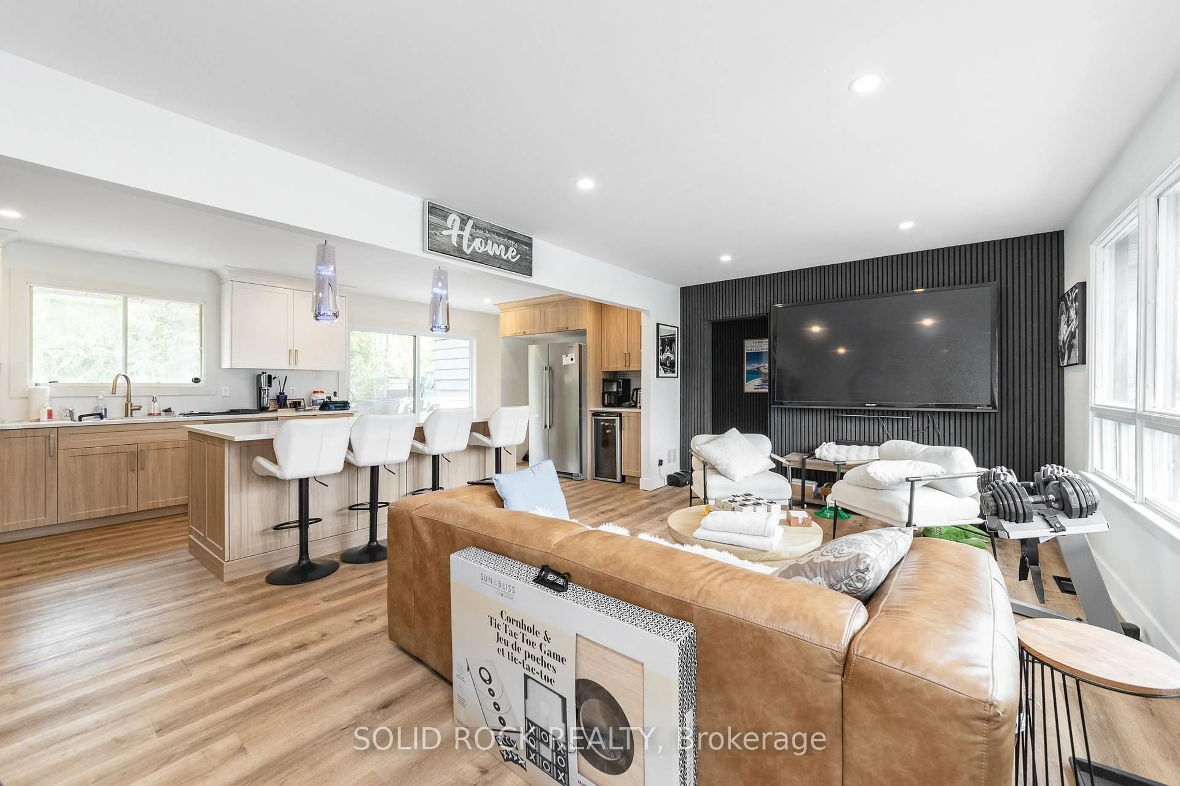 Open concept kitchen, wood/laminate floor for 20 Norway Spruce St, Ottawa Ontario K2S 1P3