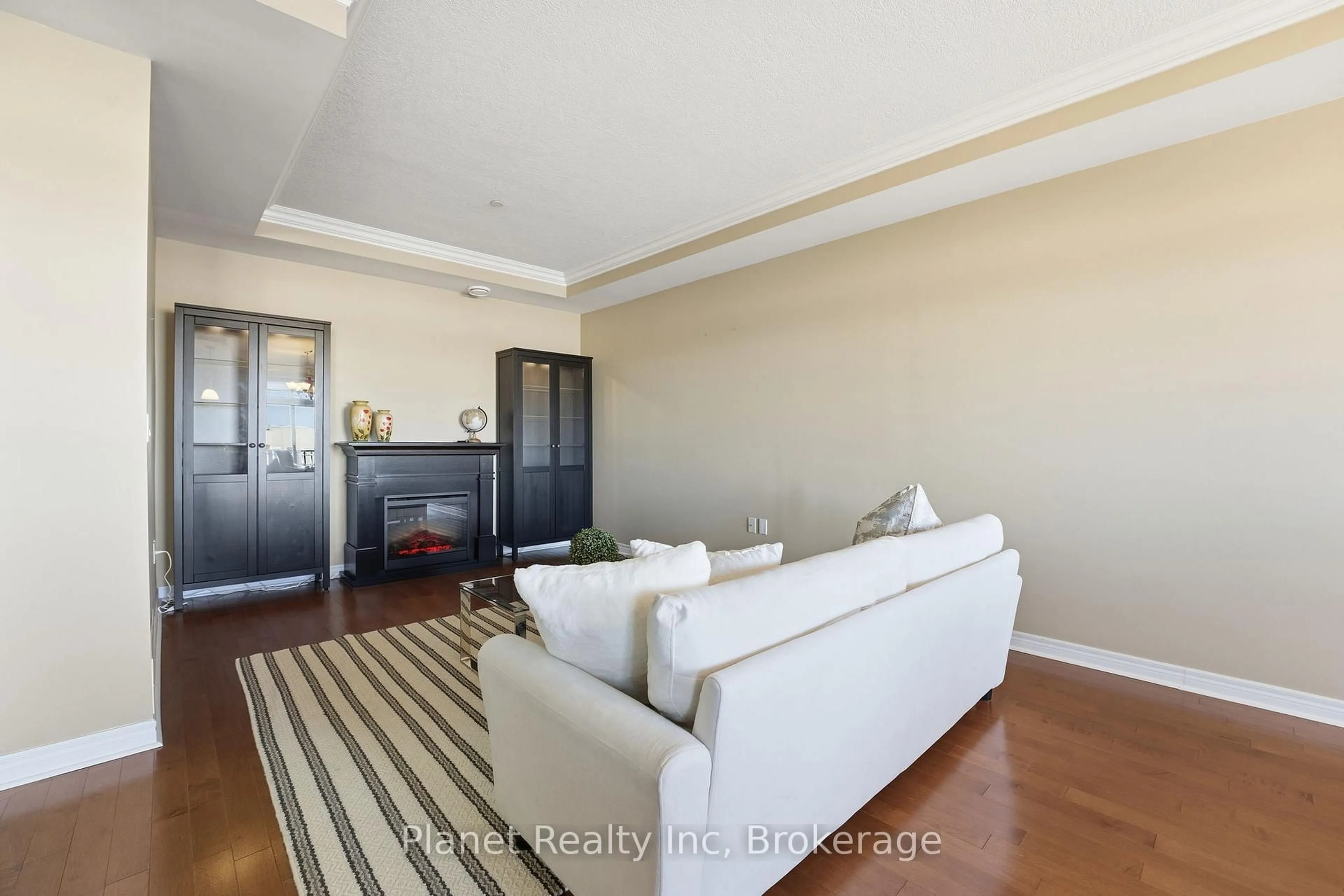 Living room with furniture, unknown for 65 BAYBERRY Dr #C305, Guelph Ontario N1G 5K8