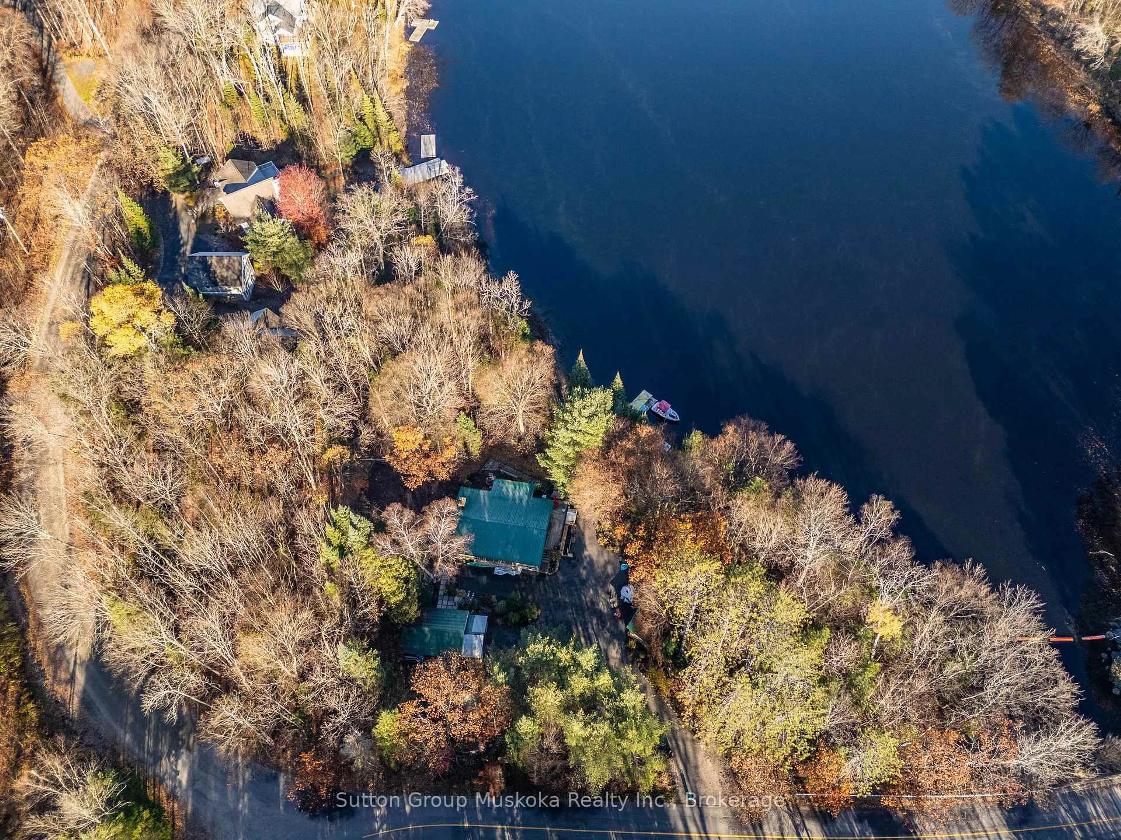 A pic from outside/outdoor area/front of a property/back of a property/a pic from drone, water/lake/river/ocean view for 236 Hoodstown Rd, Huntsville Ontario P1H 2J2