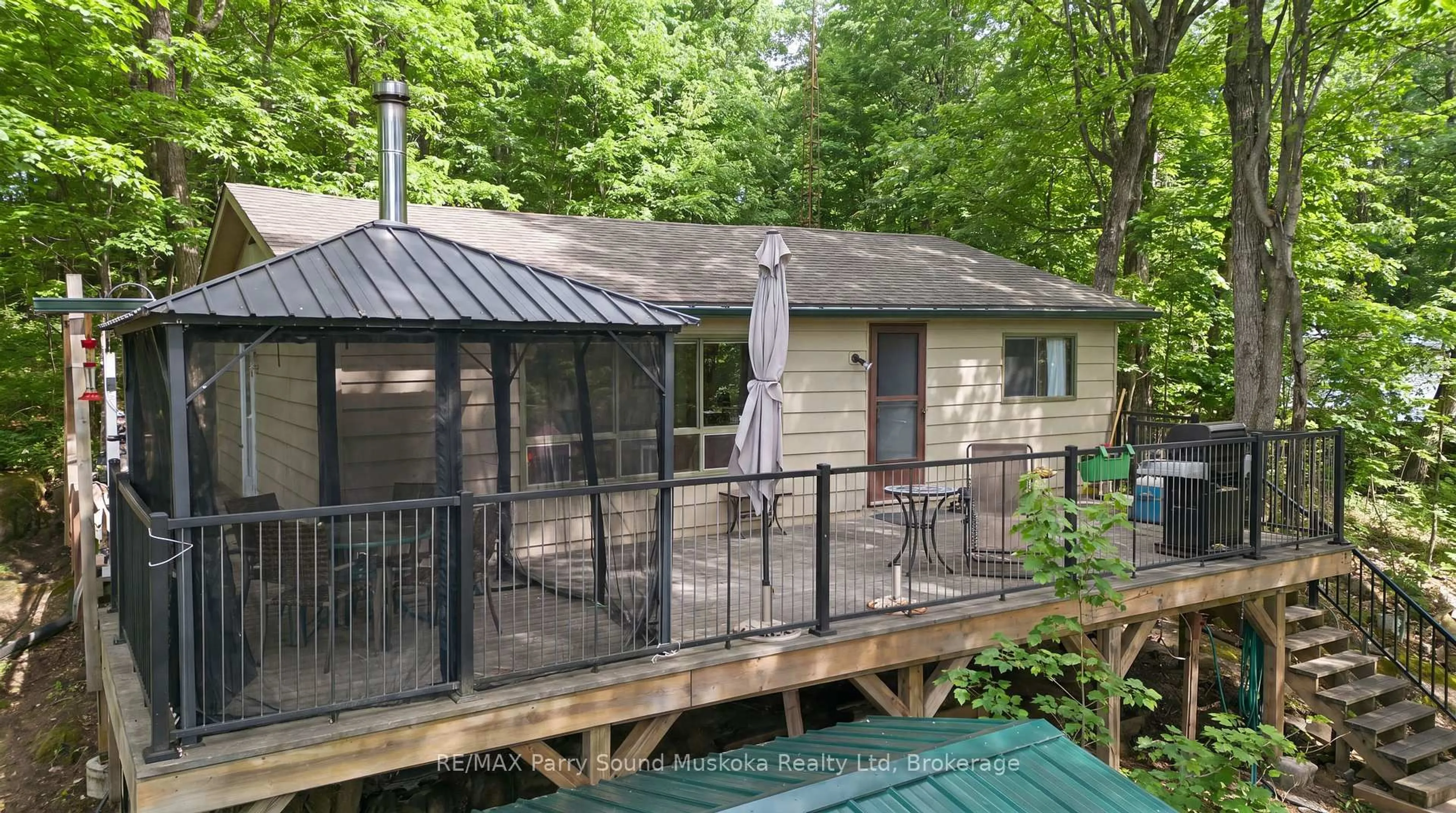 Patio, forest/trees view for 275 Salmon Lake Rd, Seguin Ontario P2A 0B2