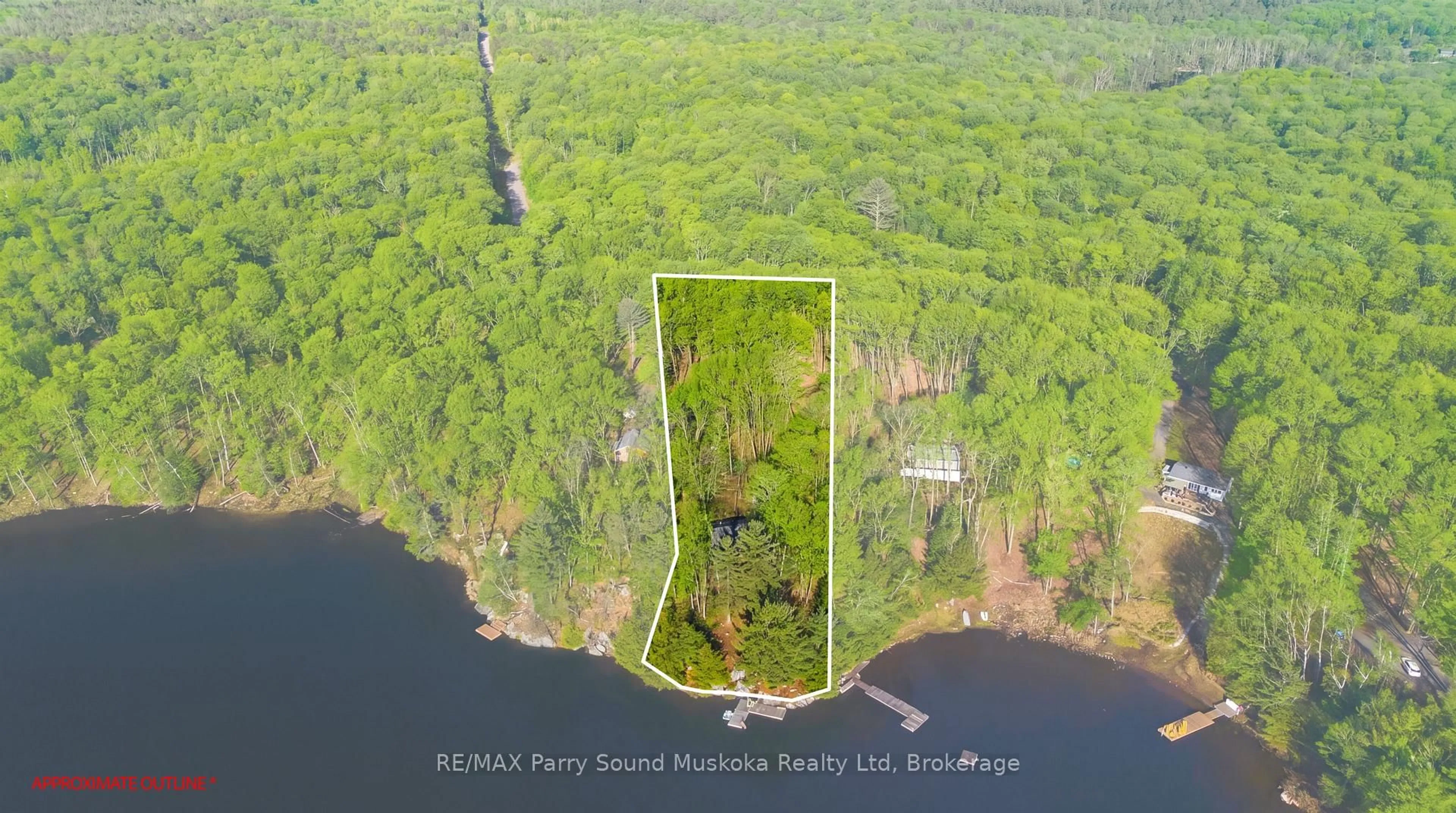 A pic from outside/outdoor area/front of a property/back of a property/a pic from drone, water/lake/river/ocean view for 275 Salmon Lake Rd, Seguin Ontario P2A 0B2