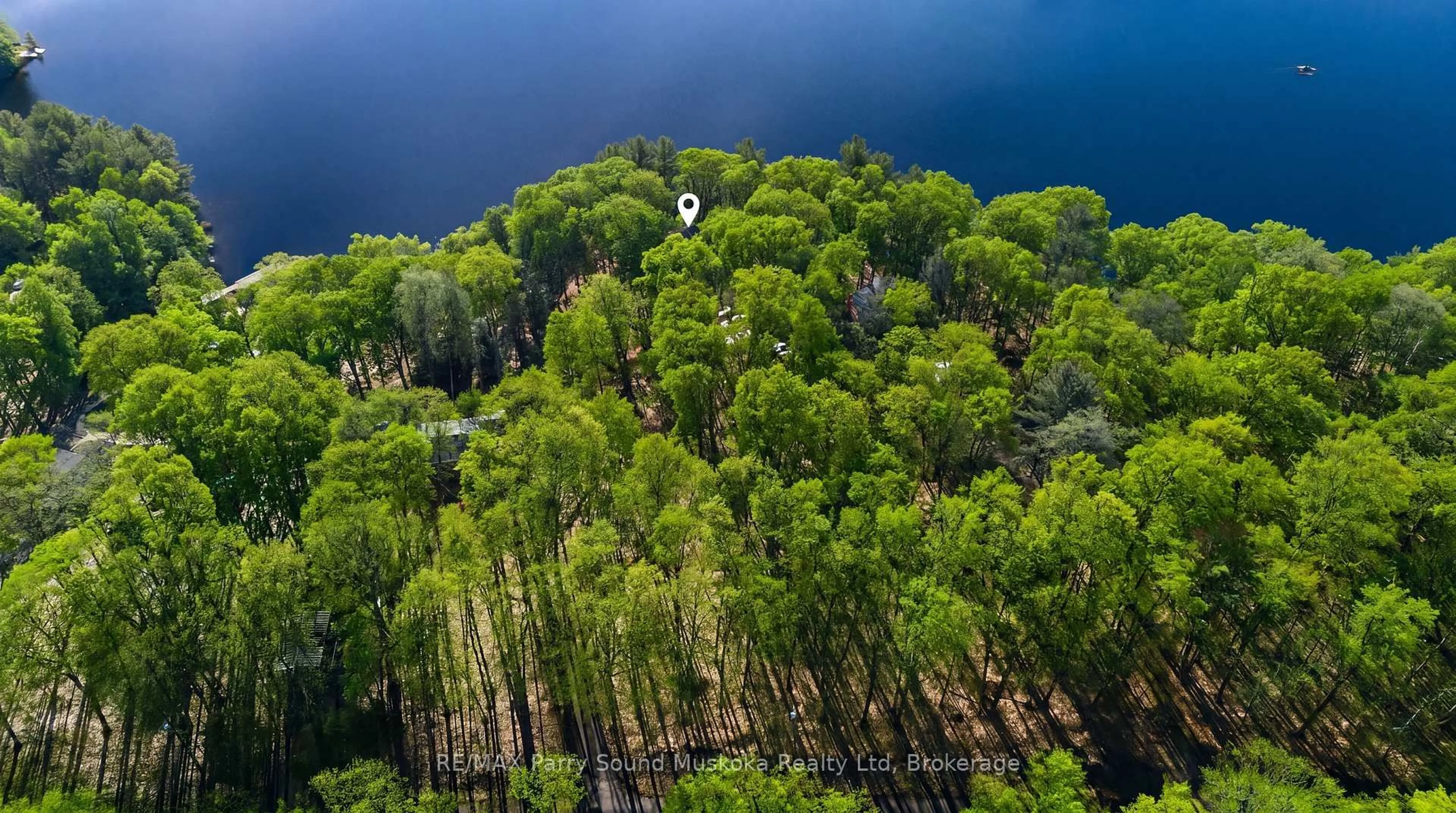 A pic from outside/outdoor area/front of a property/back of a property/a pic from drone, forest/trees view for 275 Salmon Lake Rd, Seguin Ontario P2A 0B2