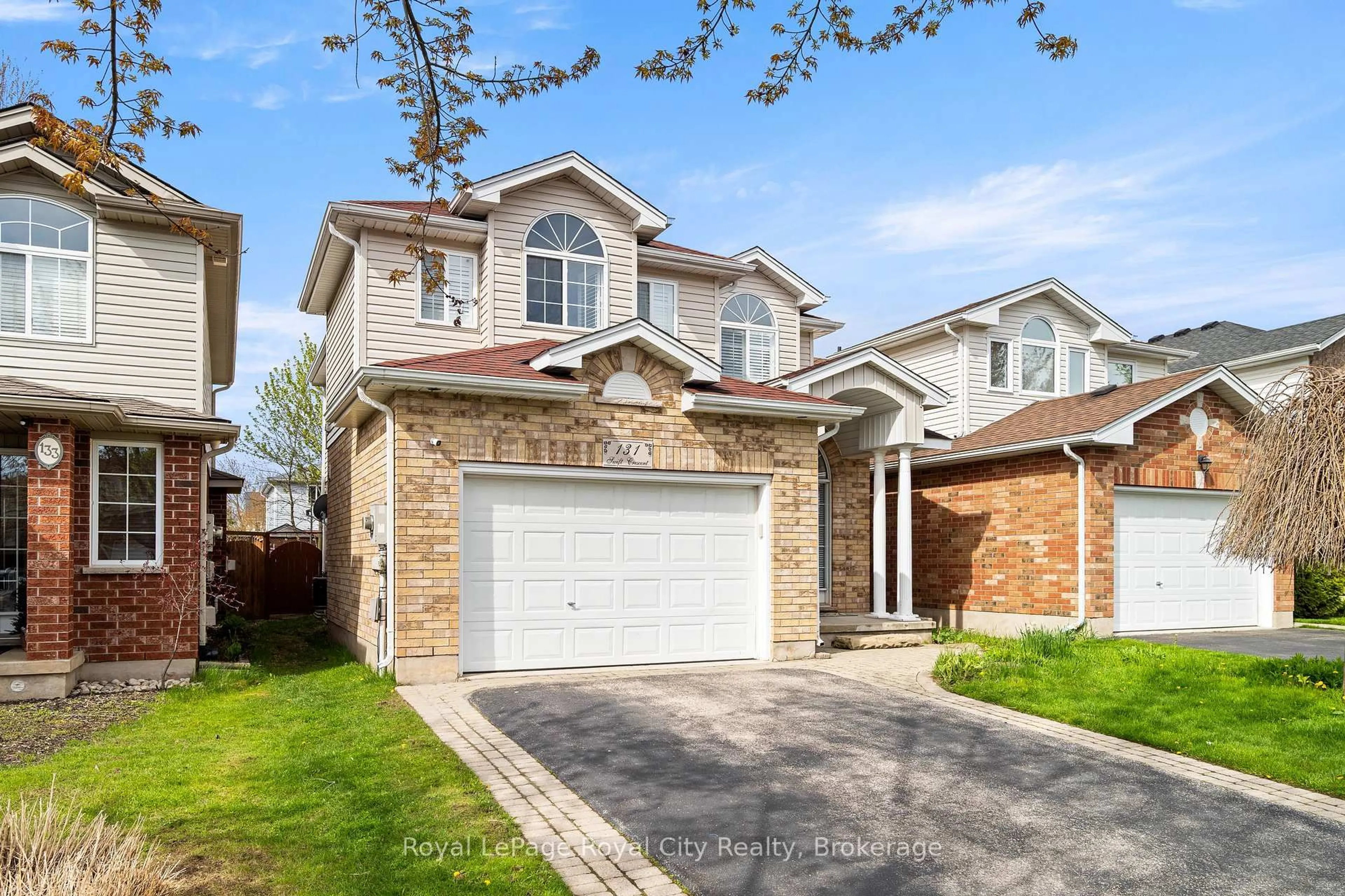 Home with brick exterior material, street for 131 Swift Cres, Guelph Ontario N1E 7J2