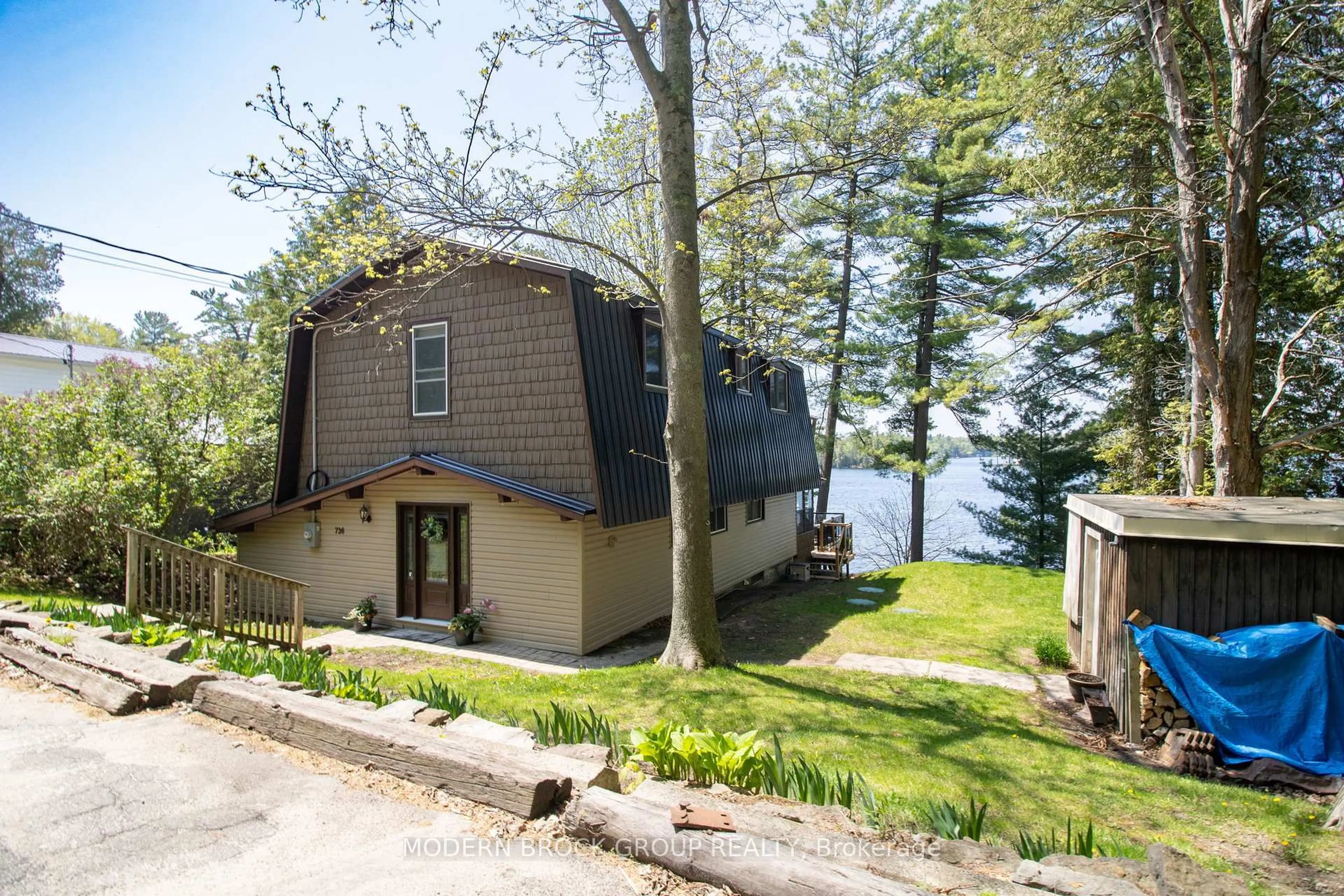 A pic from outside/outdoor area/front of a property/back of a property/a pic from drone, water/lake/river/ocean view for 736 Cedar Park Lane, Athens Ontario K0E 1B0