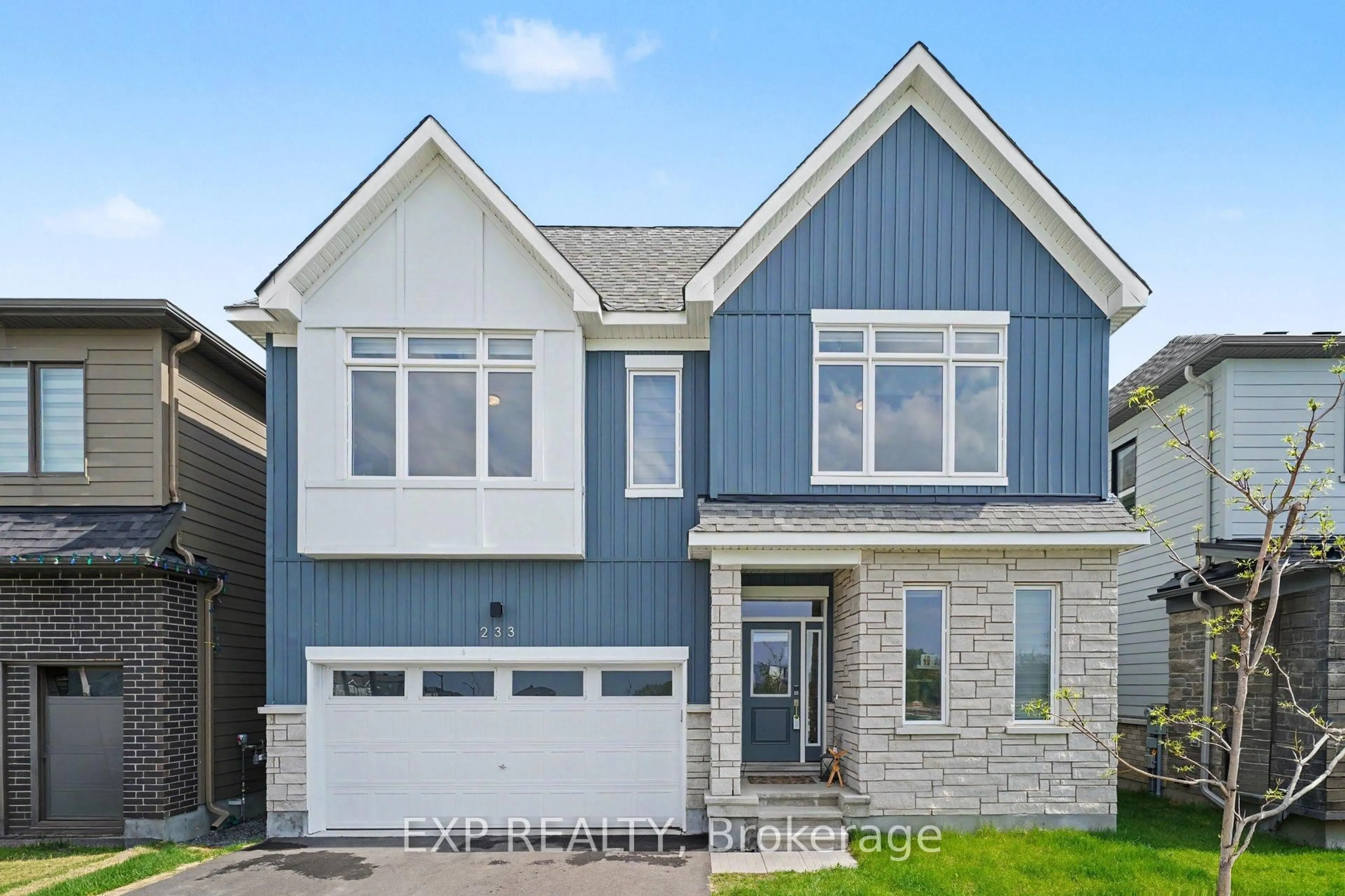 Home with vinyl exterior material, street for 233 Conservancy Dr, Ottawa Ontario K2J 7M5
